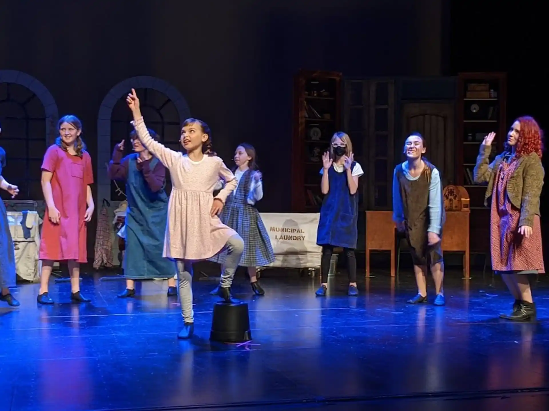a group of people on a stage