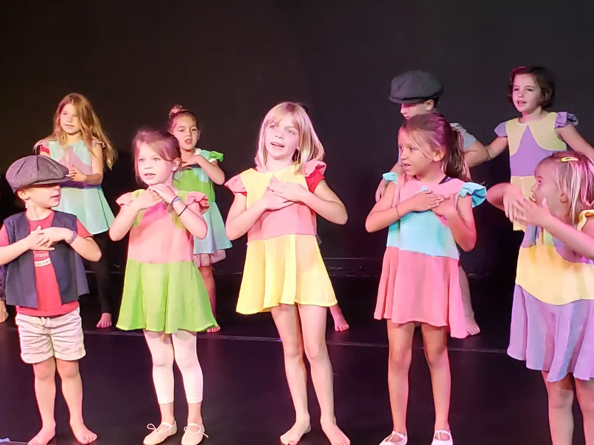 a group of children on a stage