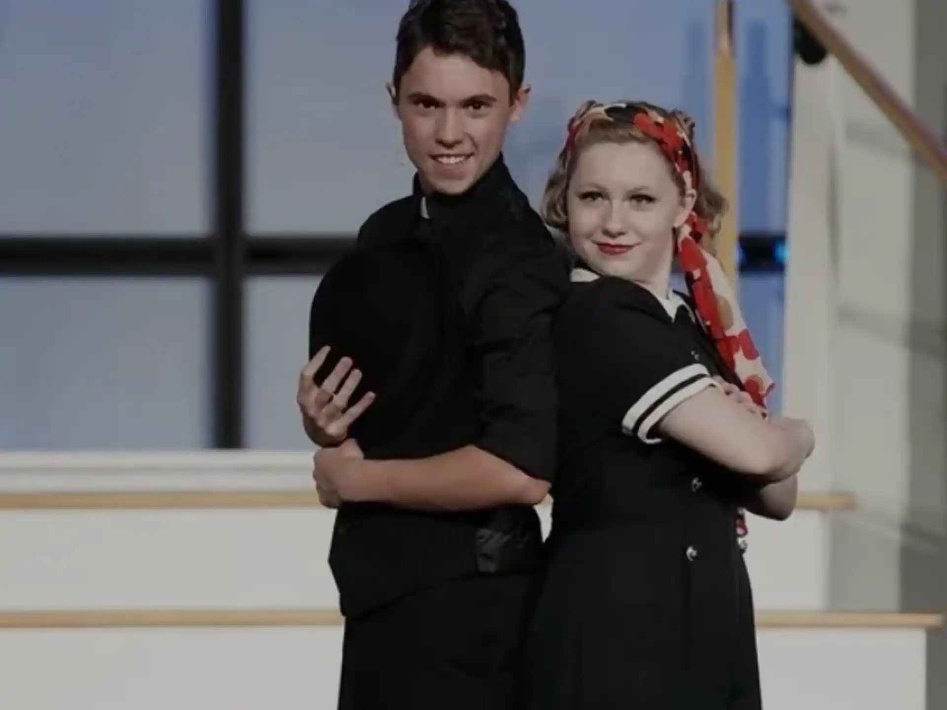 a man and woman posing for a picture