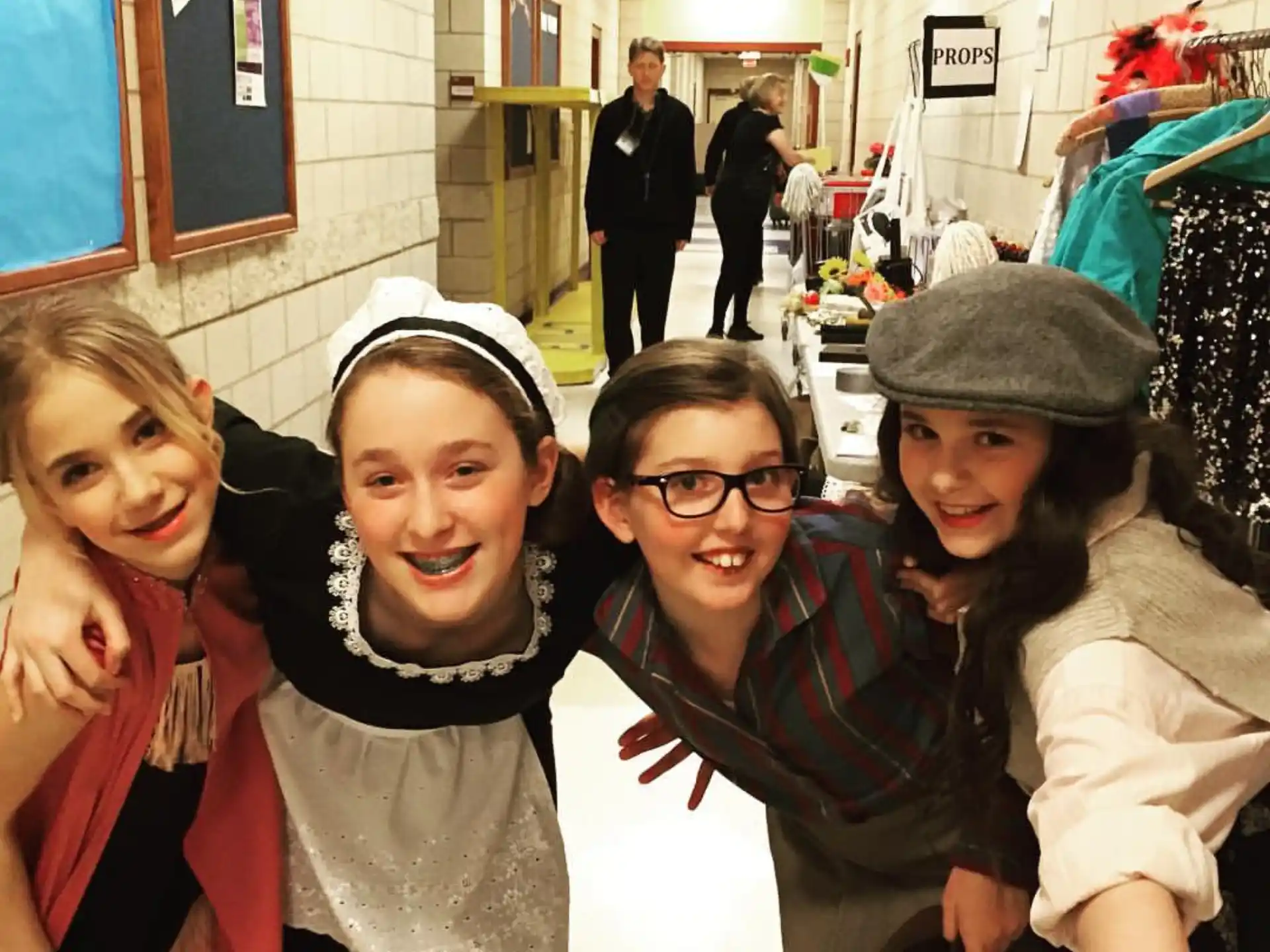 a group of girls posing for a photo