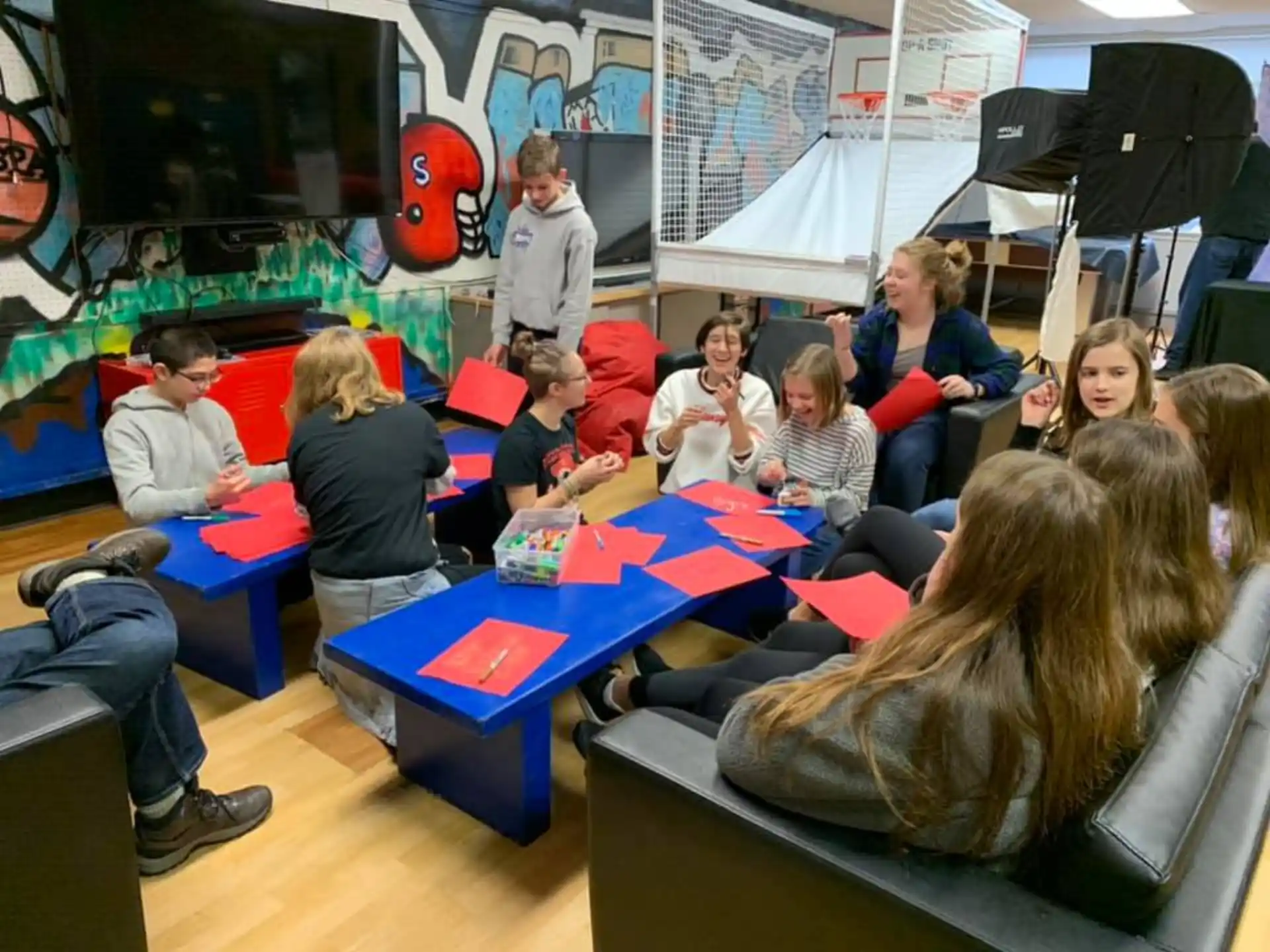 a group of people sitting at desks