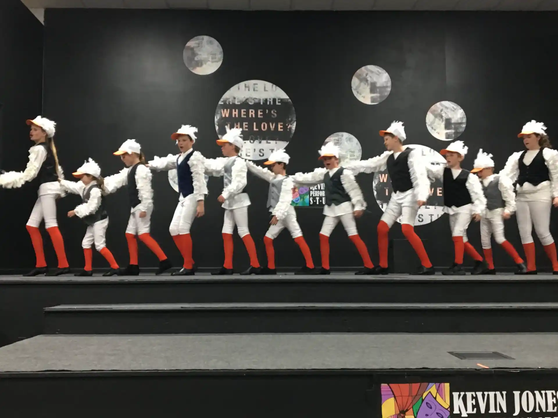 a group of people in white uniforms
