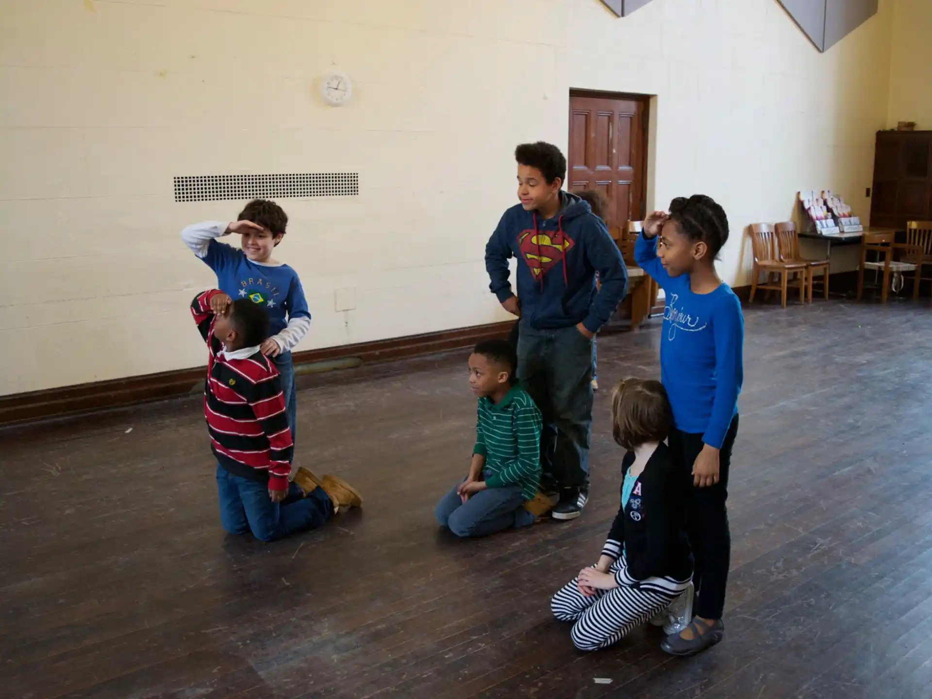 a group of people sitting on the floor