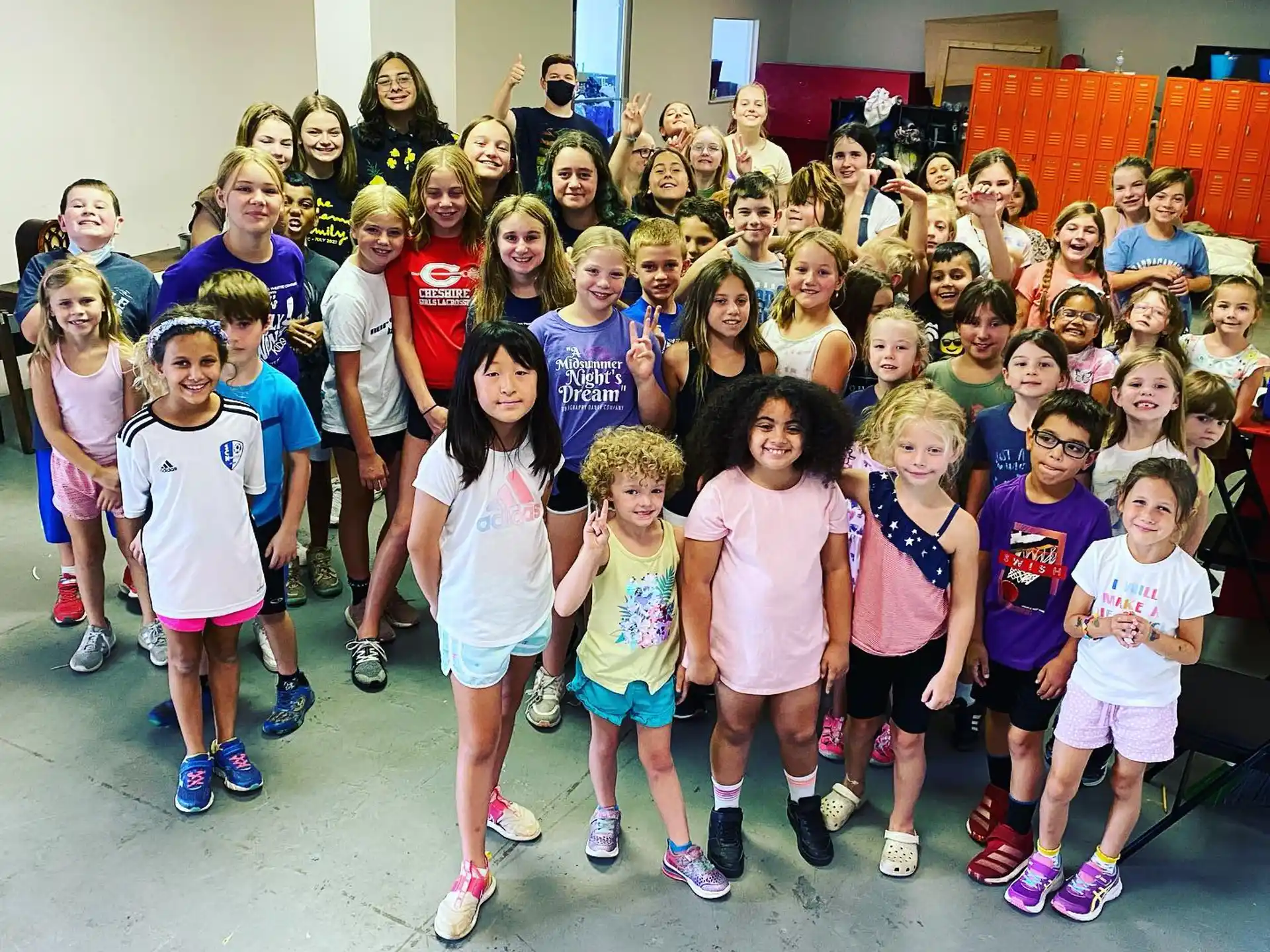 a group of children posing for a photo