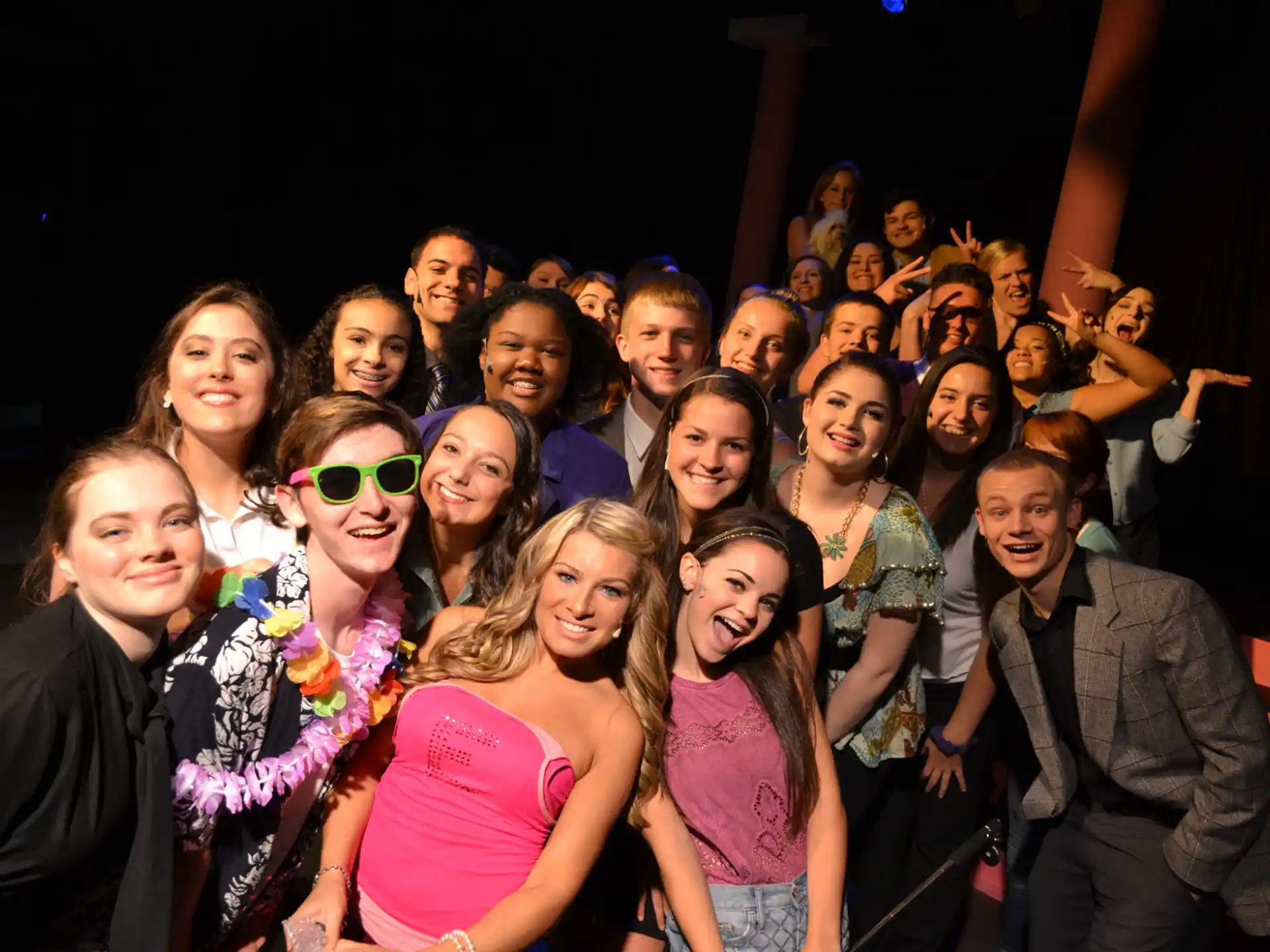 a group of people posing for a photo