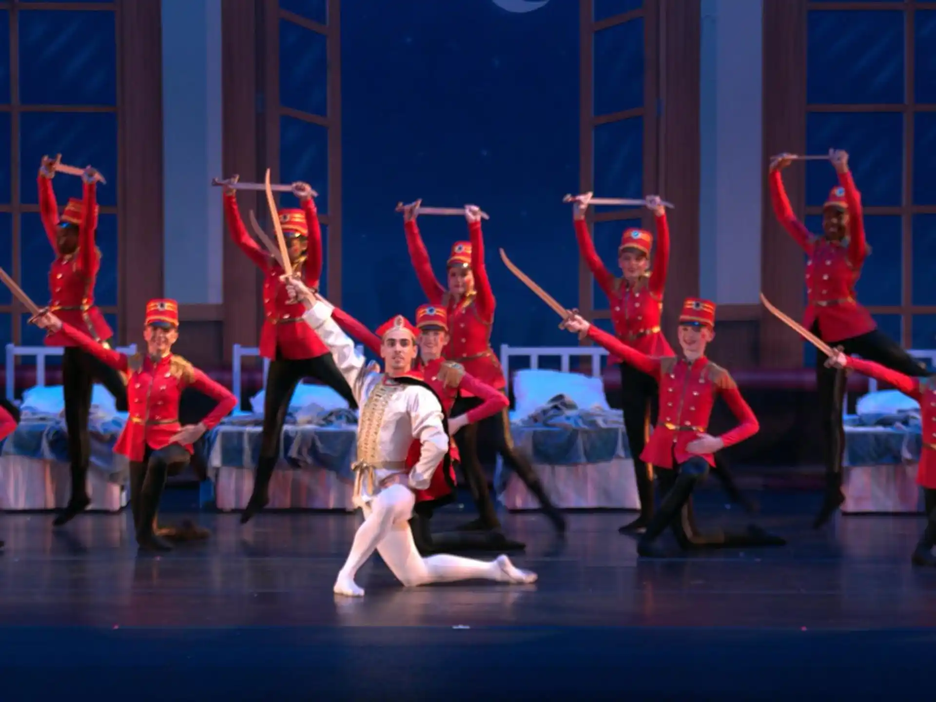 a group of people in clothing on a stage