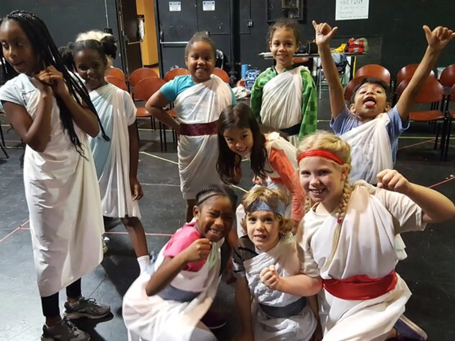 a group of children posing for a photo