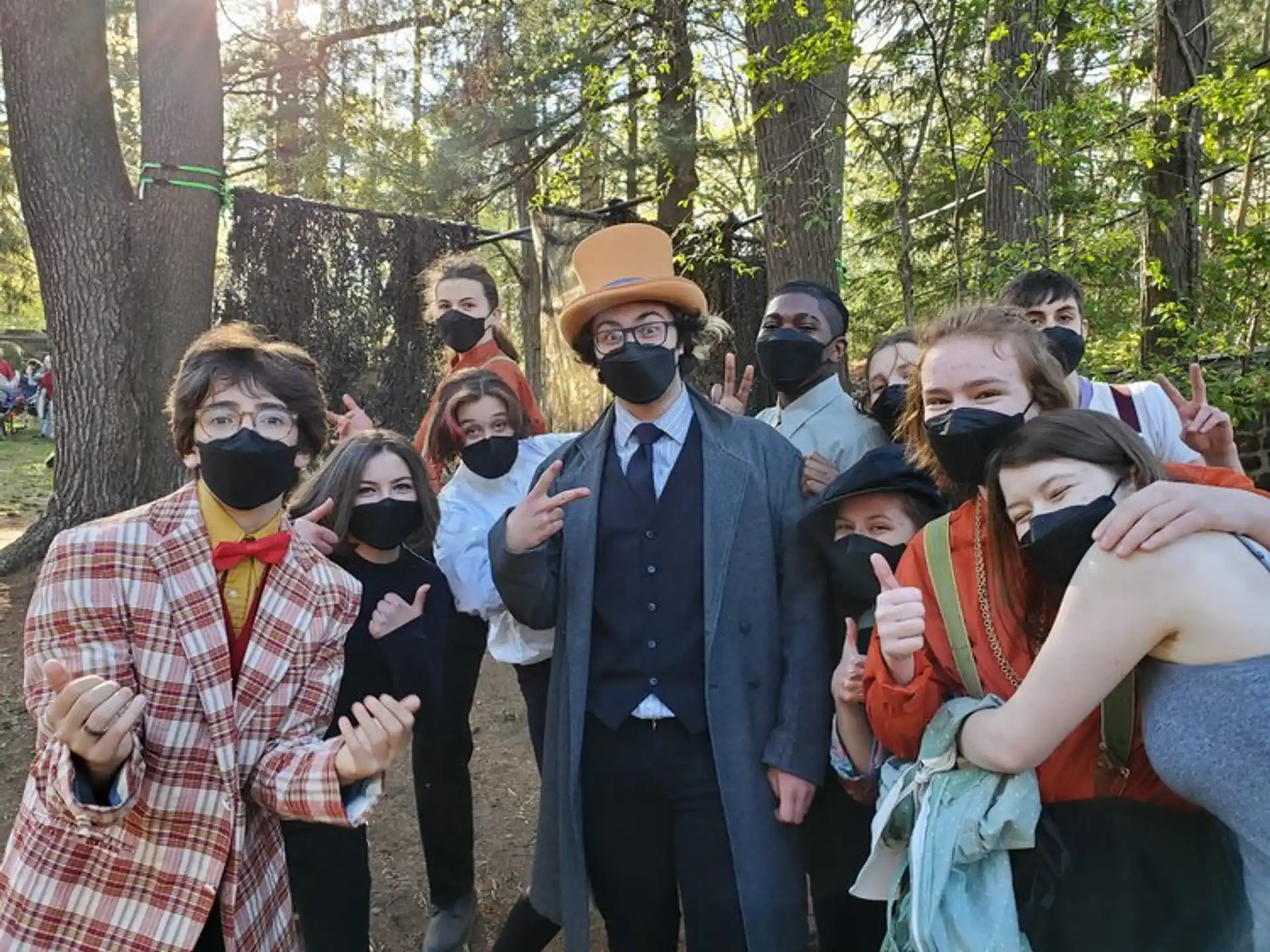 a group of people wearing masks