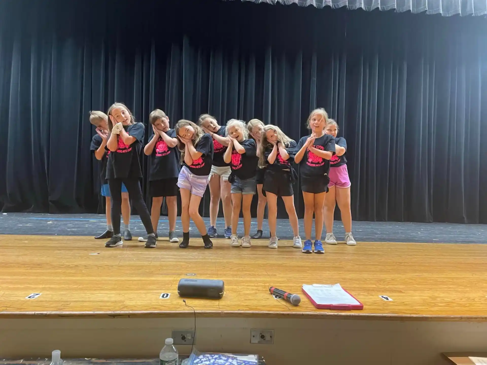 a group of girls on a stage