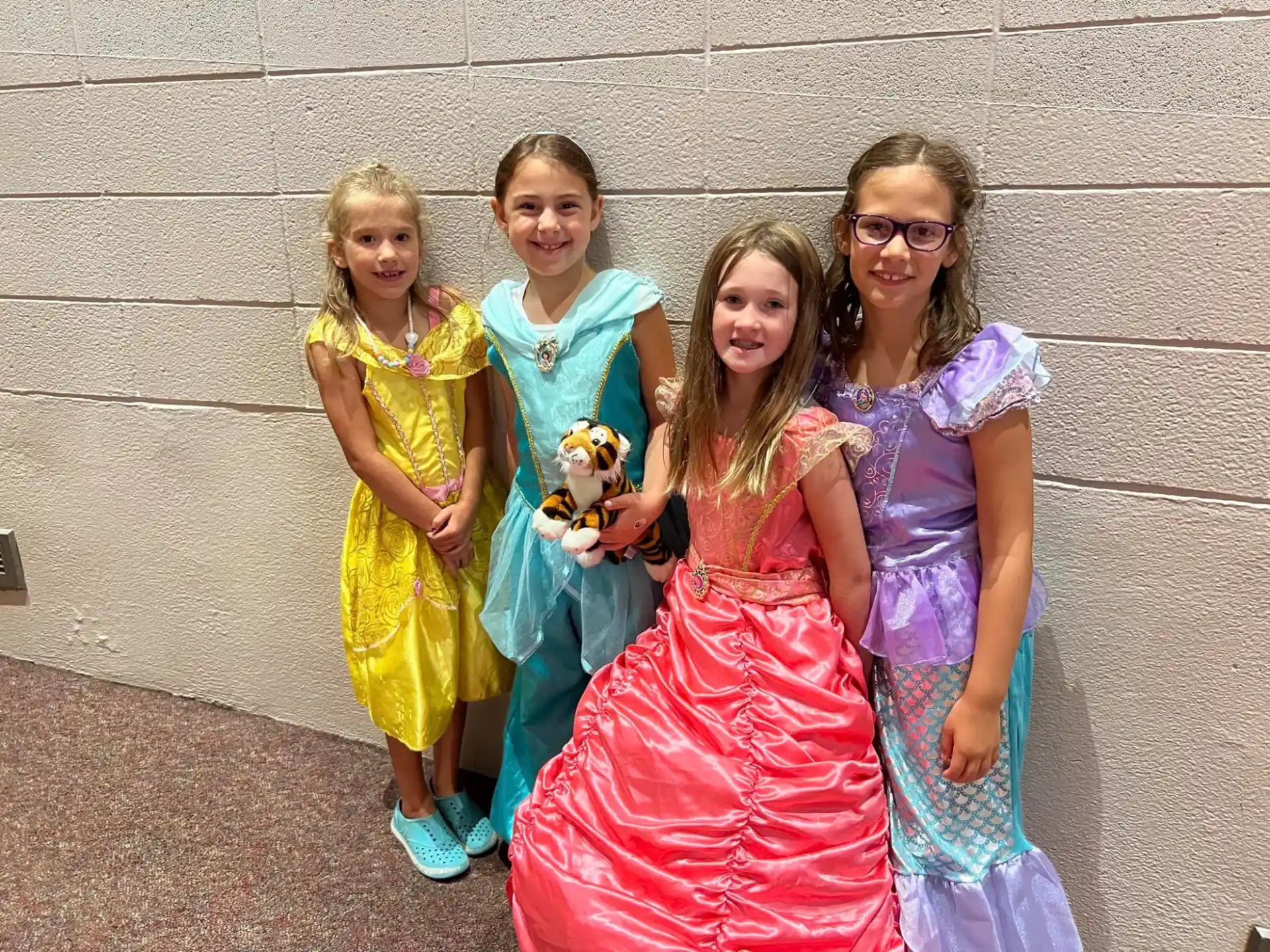 a group of girls posing for a photo