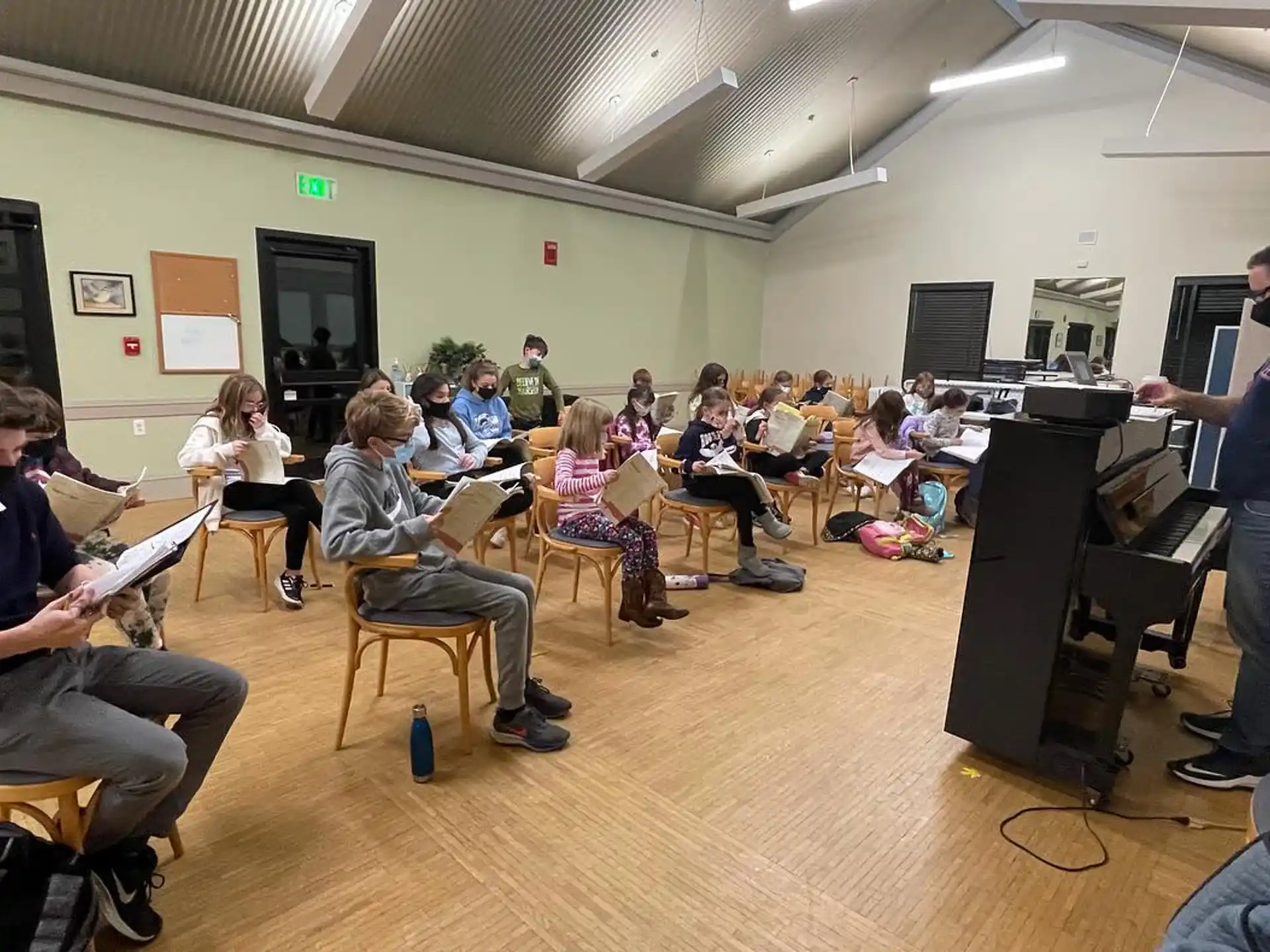 a group of people sitting in a room