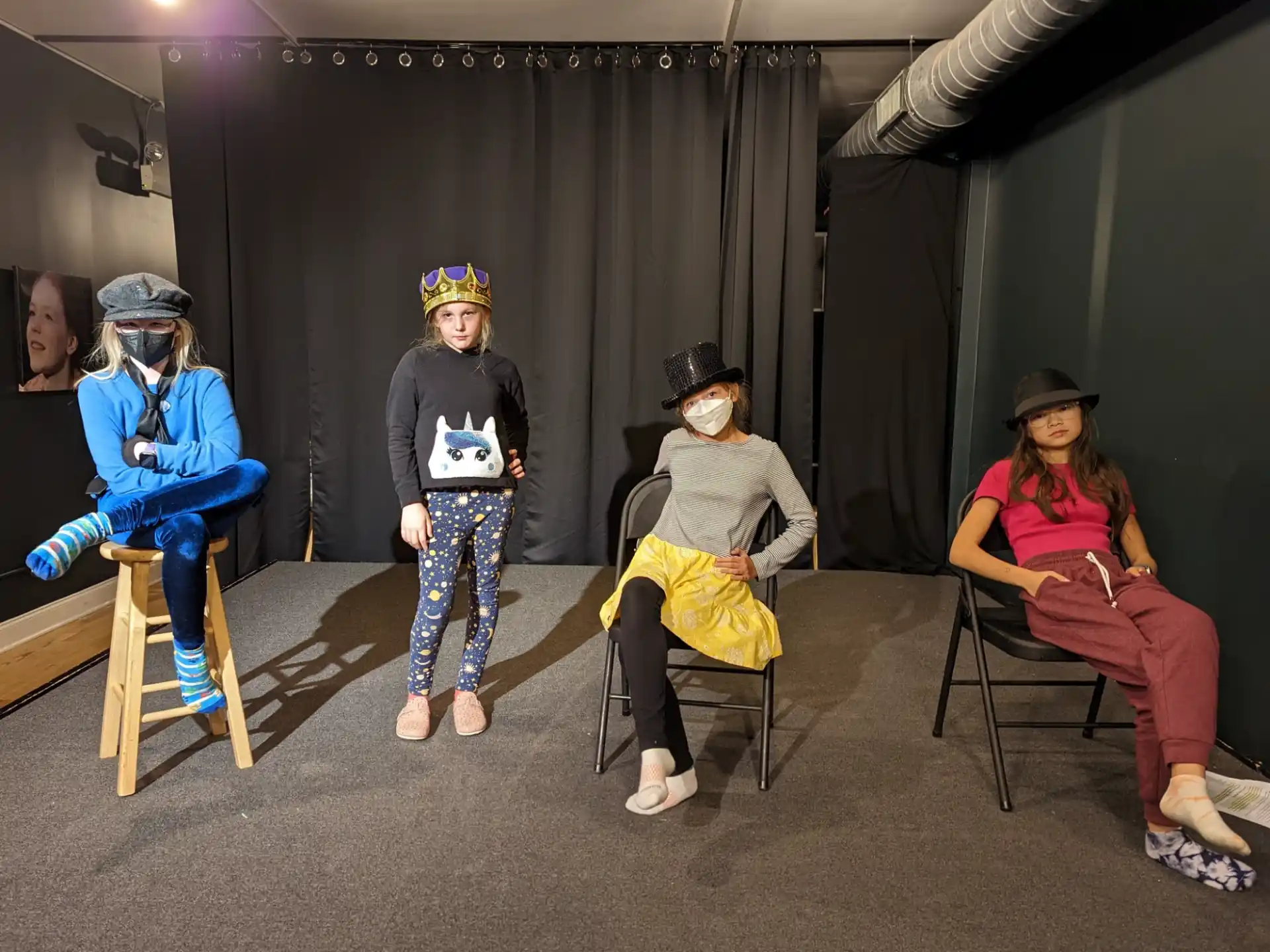 a group of people sitting on chairs