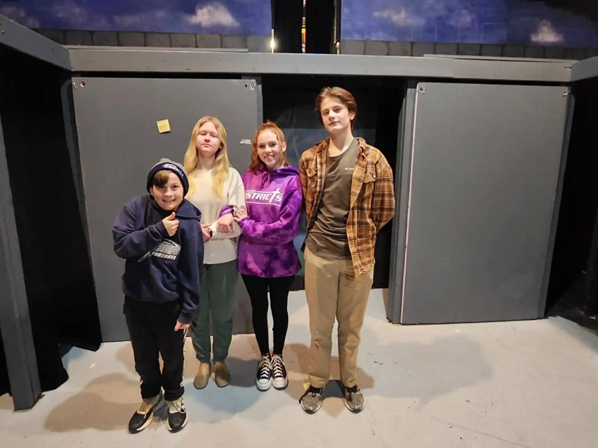 a group of people posing for a photo