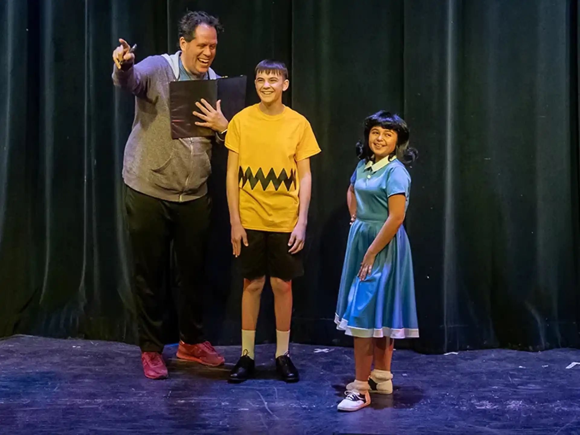 a group of people standing on a stage