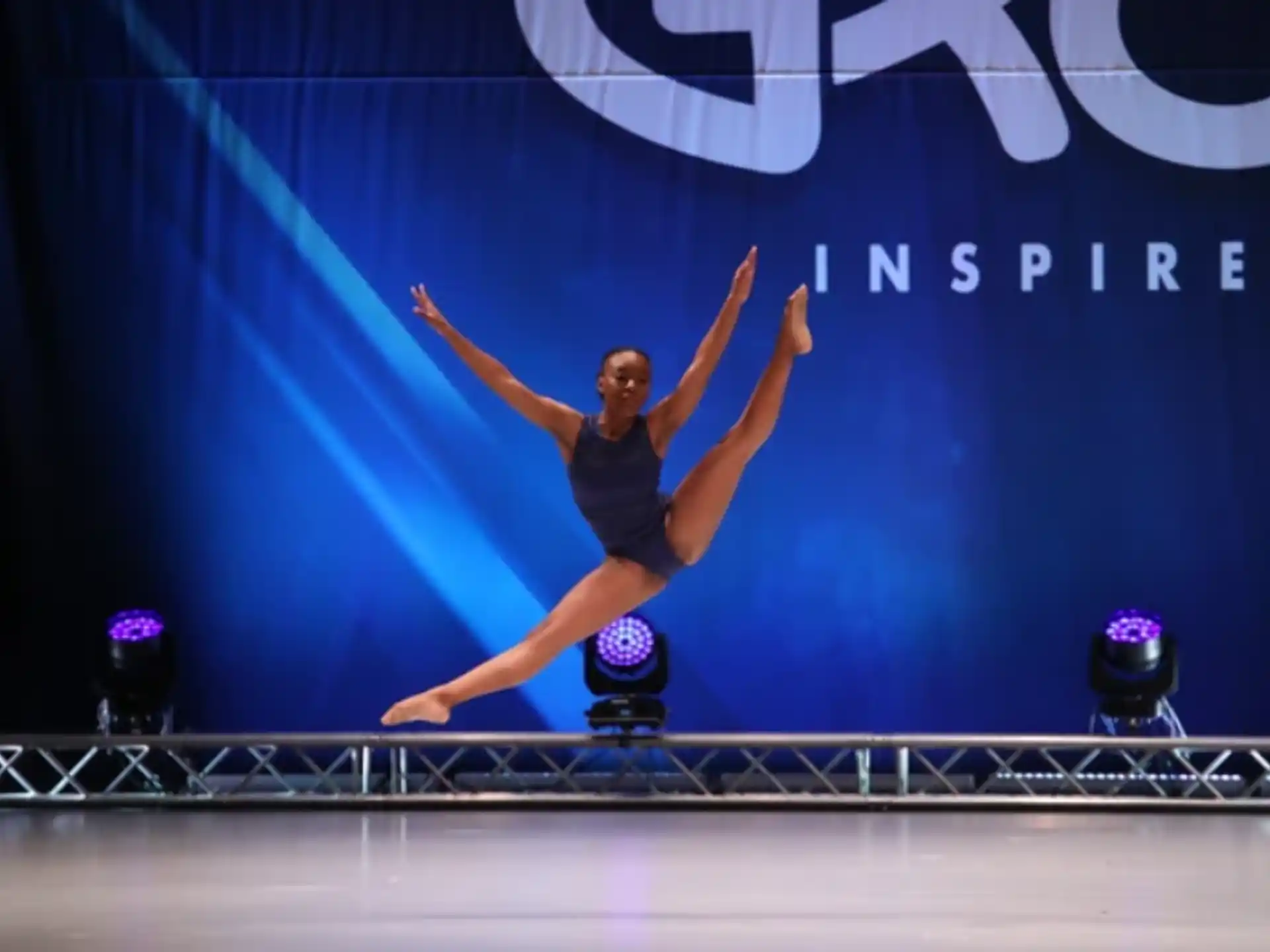 a person performing a gymnastics trick