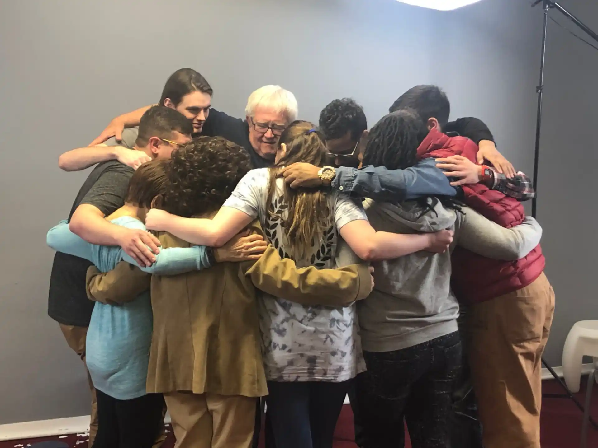 a group of people hugging