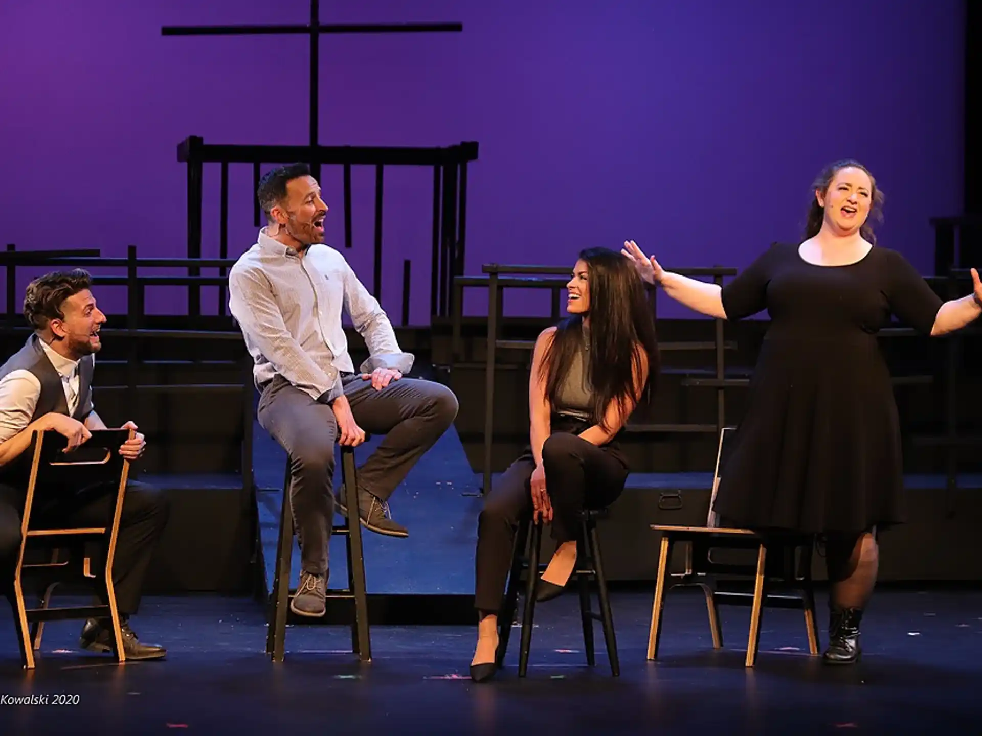 a group of people sitting on chairs