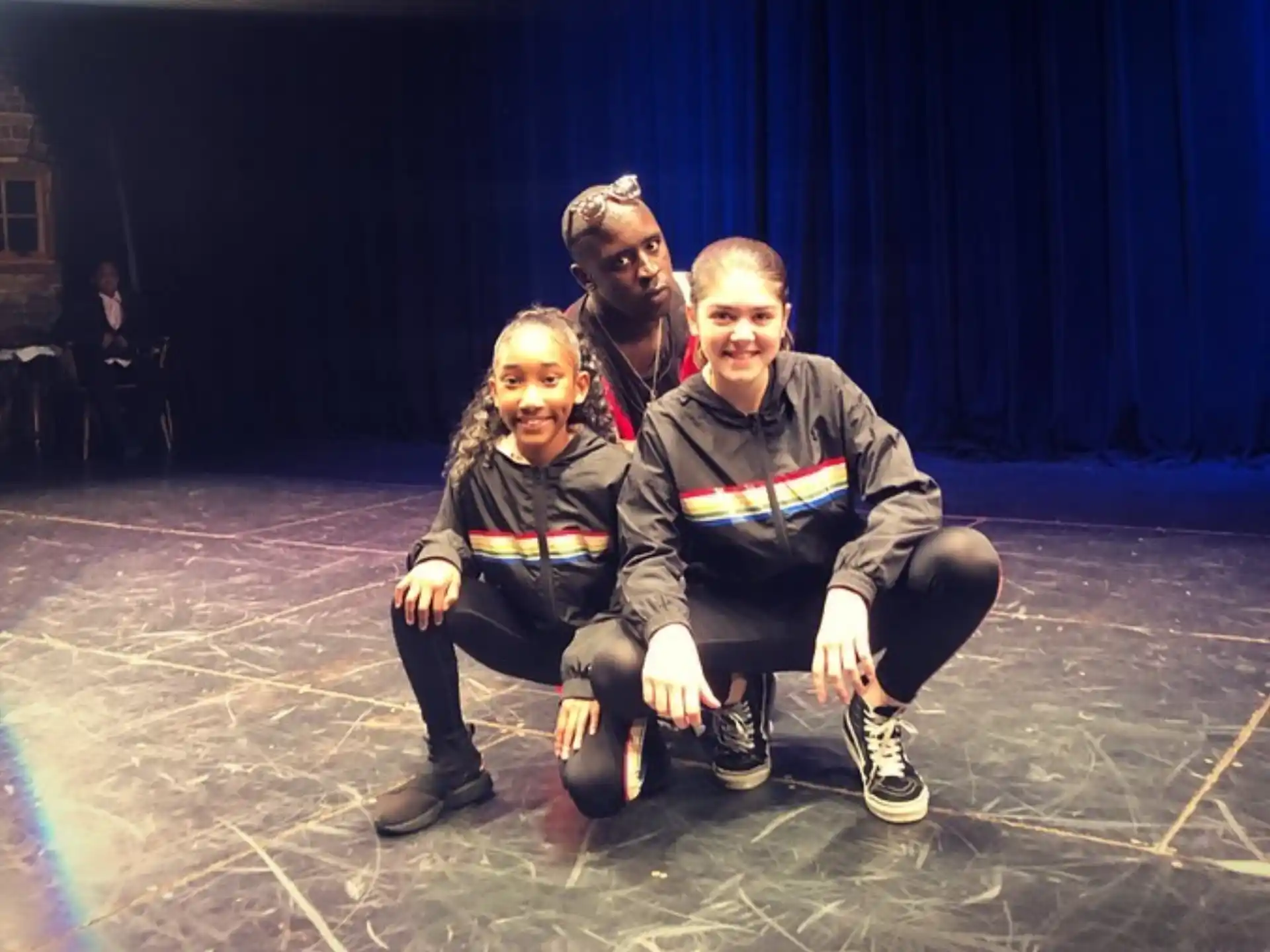 a group of people posing for the camera