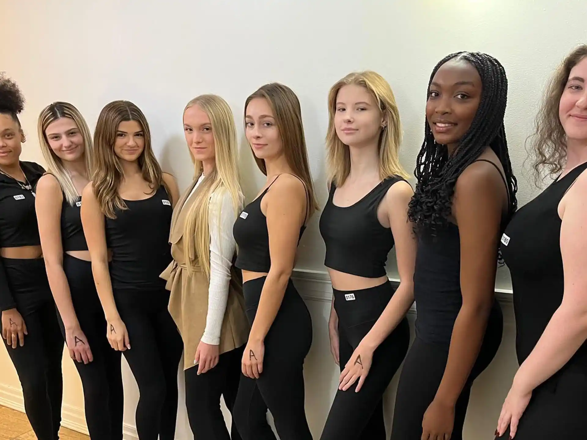 a group of women posing for a photo
