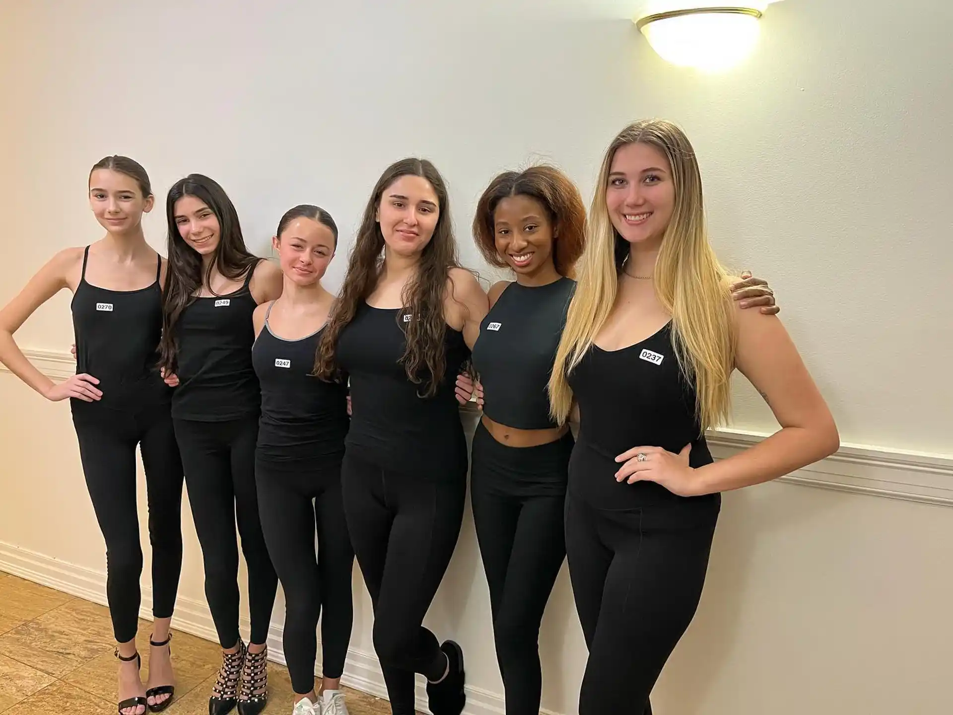 a group of women posing for a picture