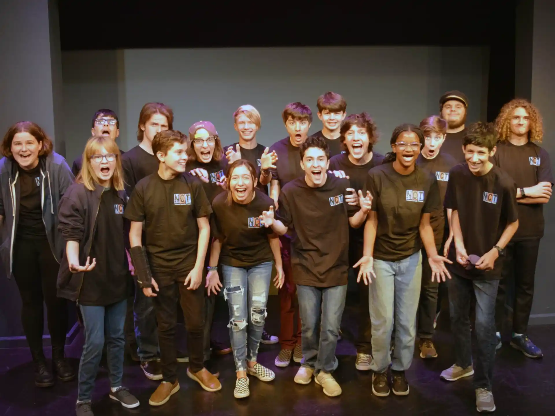 a group of people posing for a photo