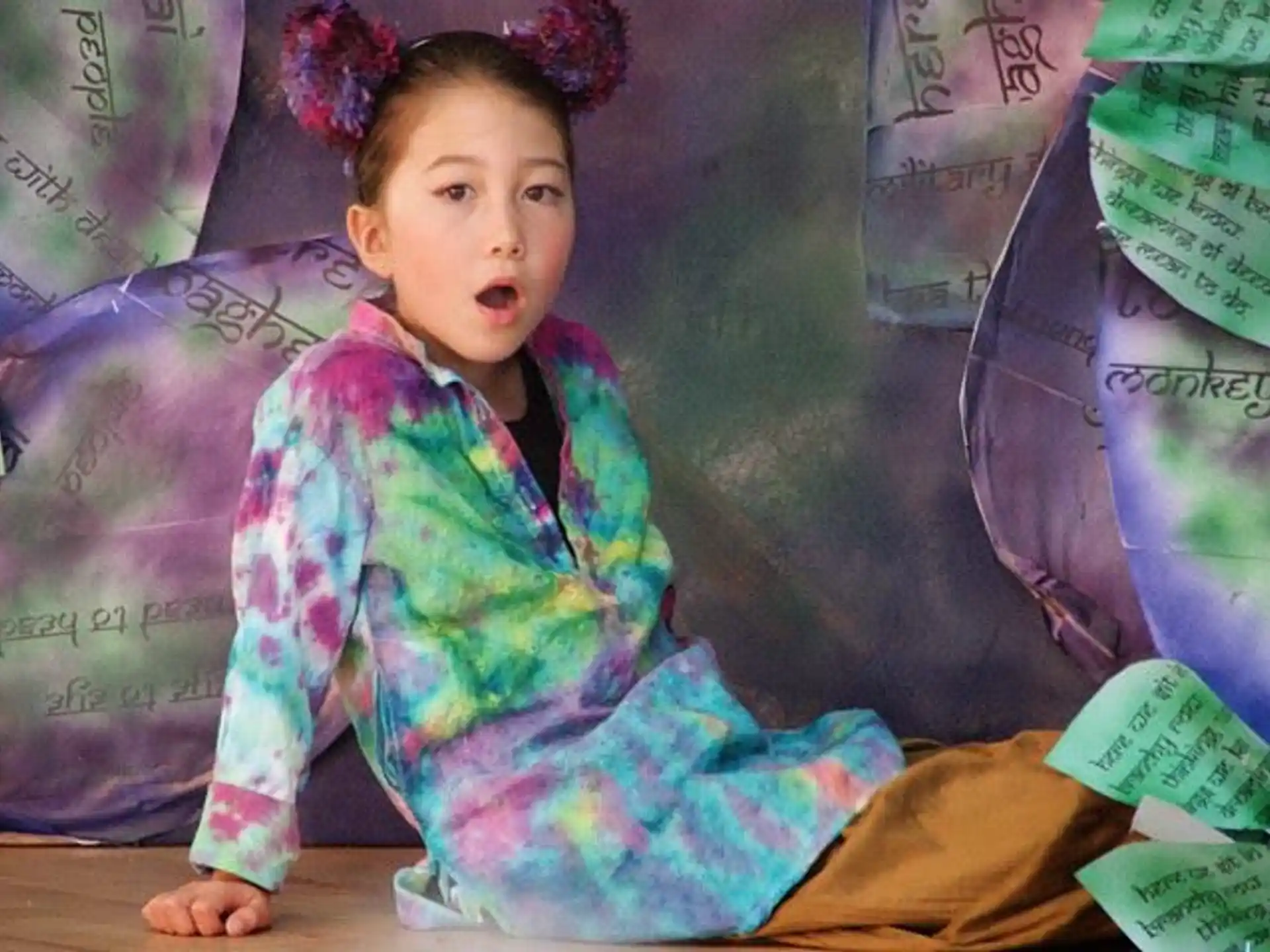 a child sitting on a table