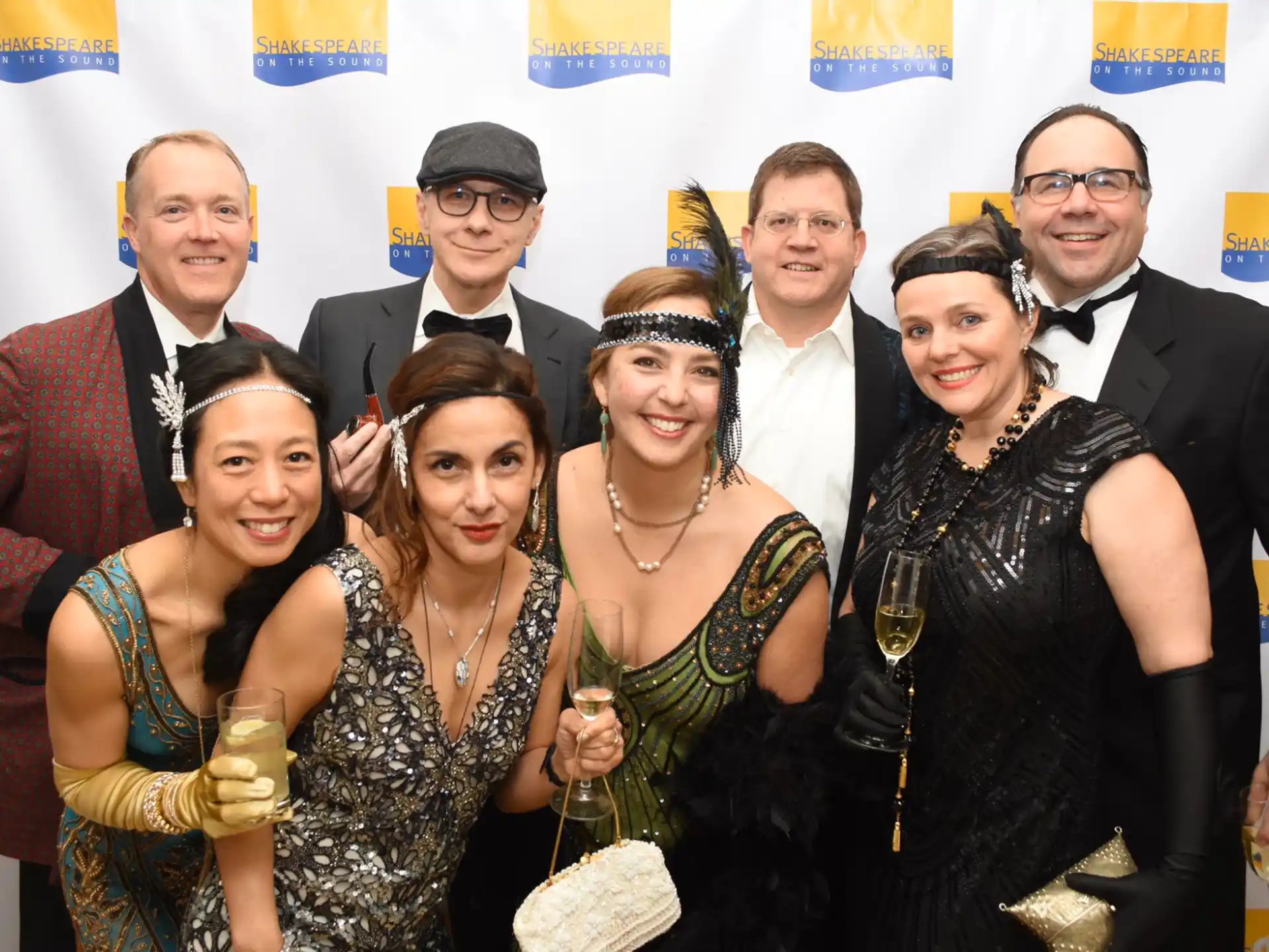 a group of people posing for a photo
