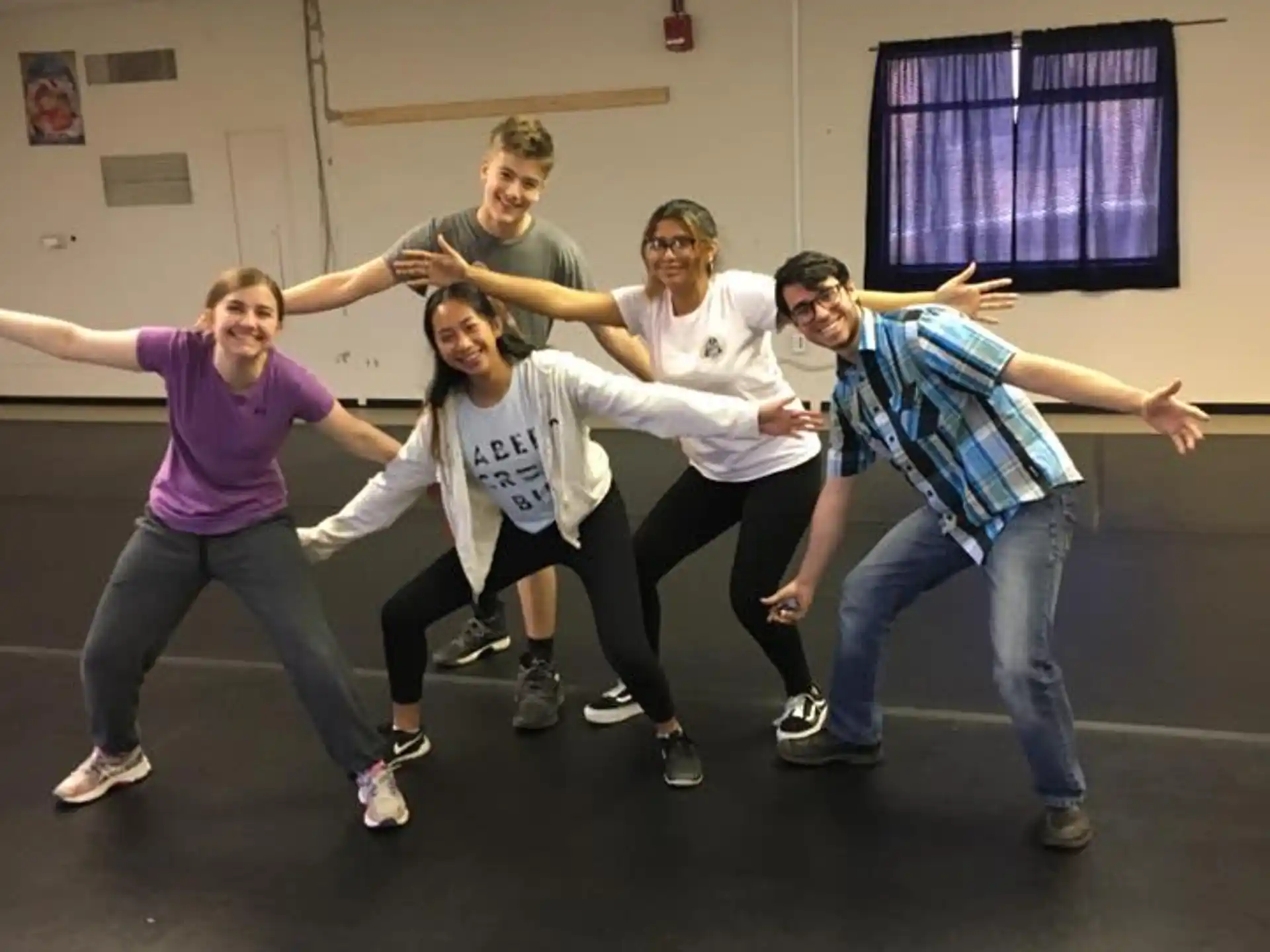 a group of people posing for a photo