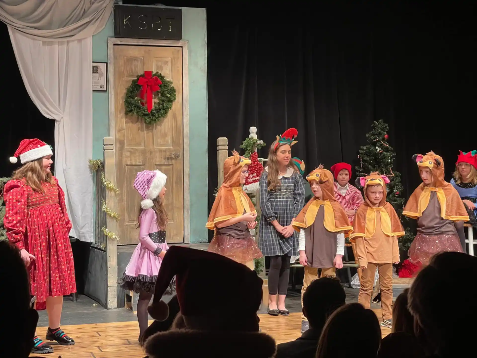 a group of children on a stage