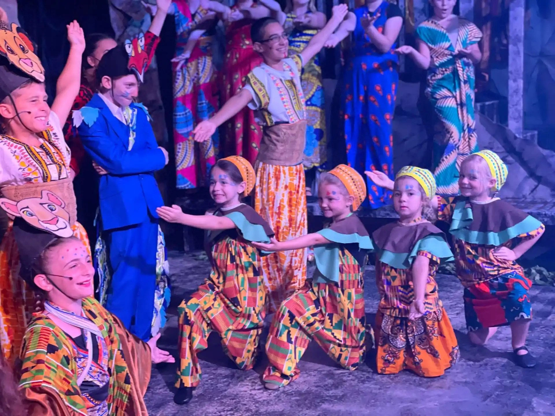 a group of children in traditional dress