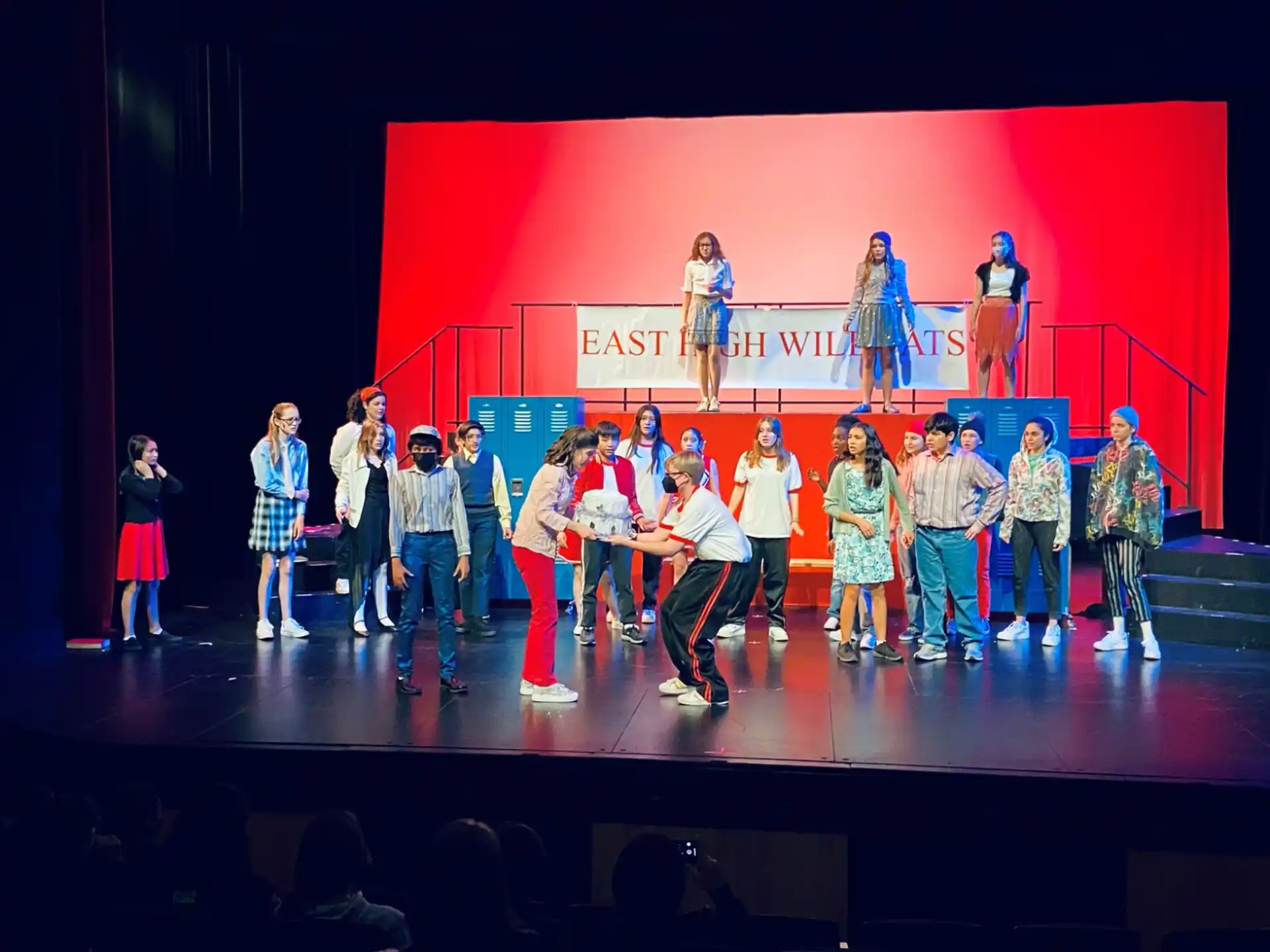 a group of people on a stage