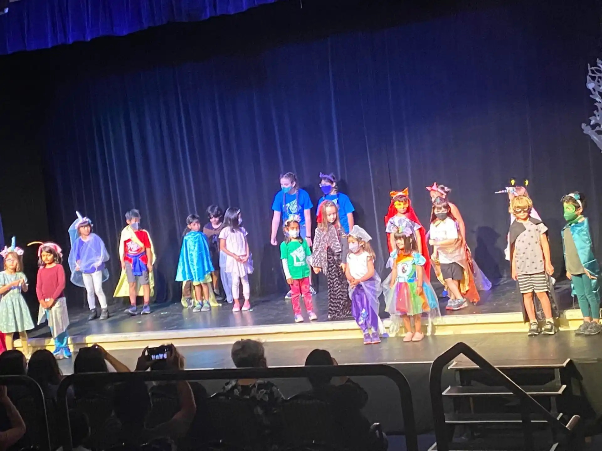a group of children on a stage