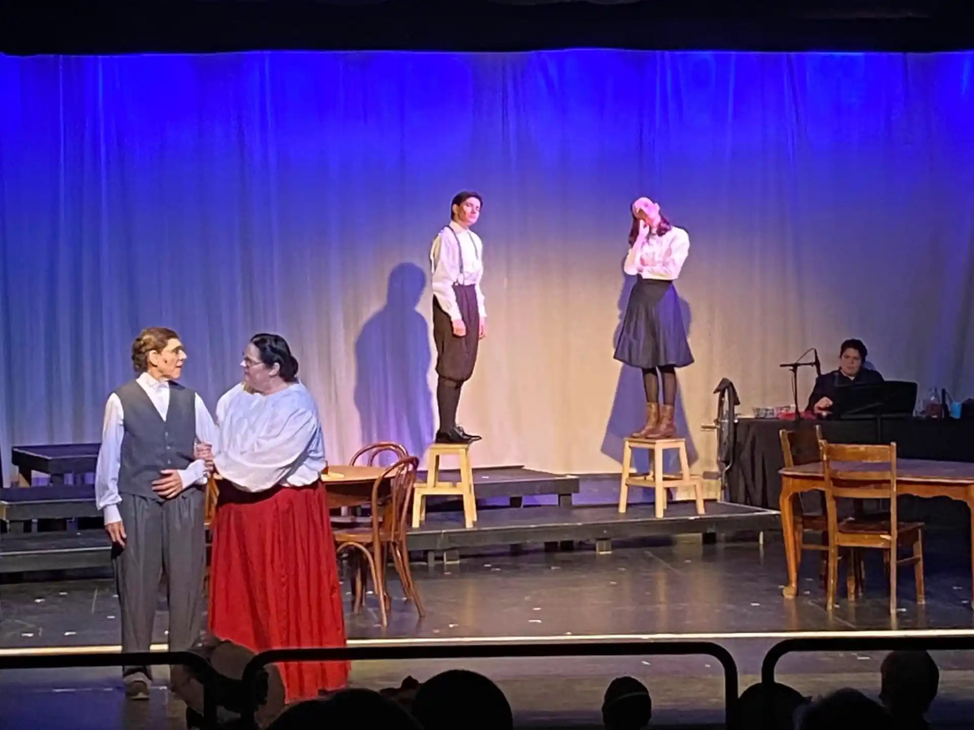 a group of people on a stage