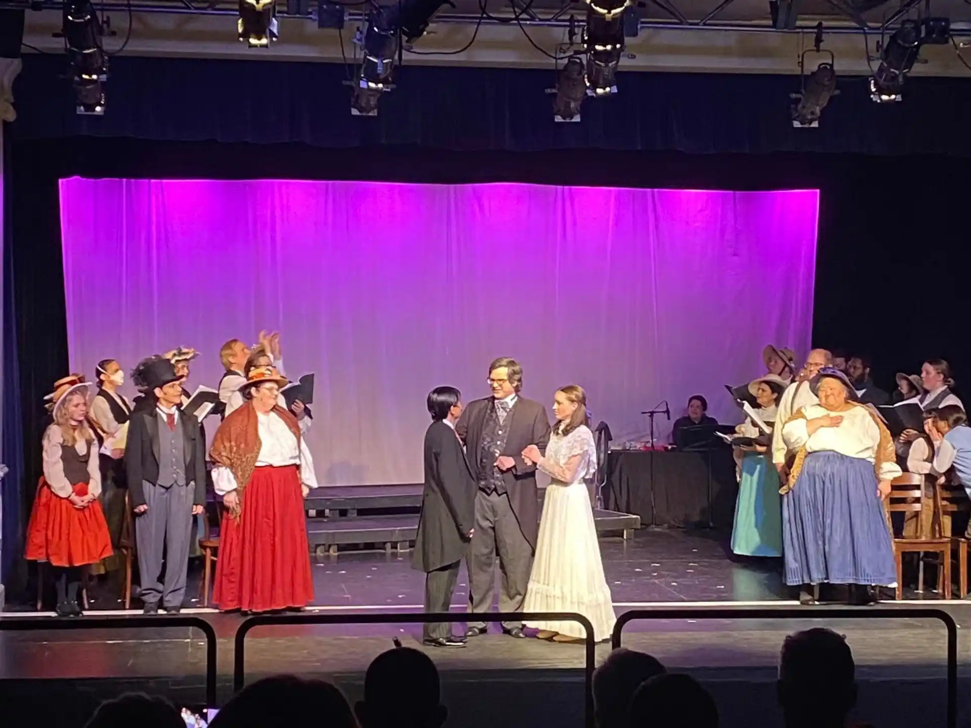 a group of people on a stage