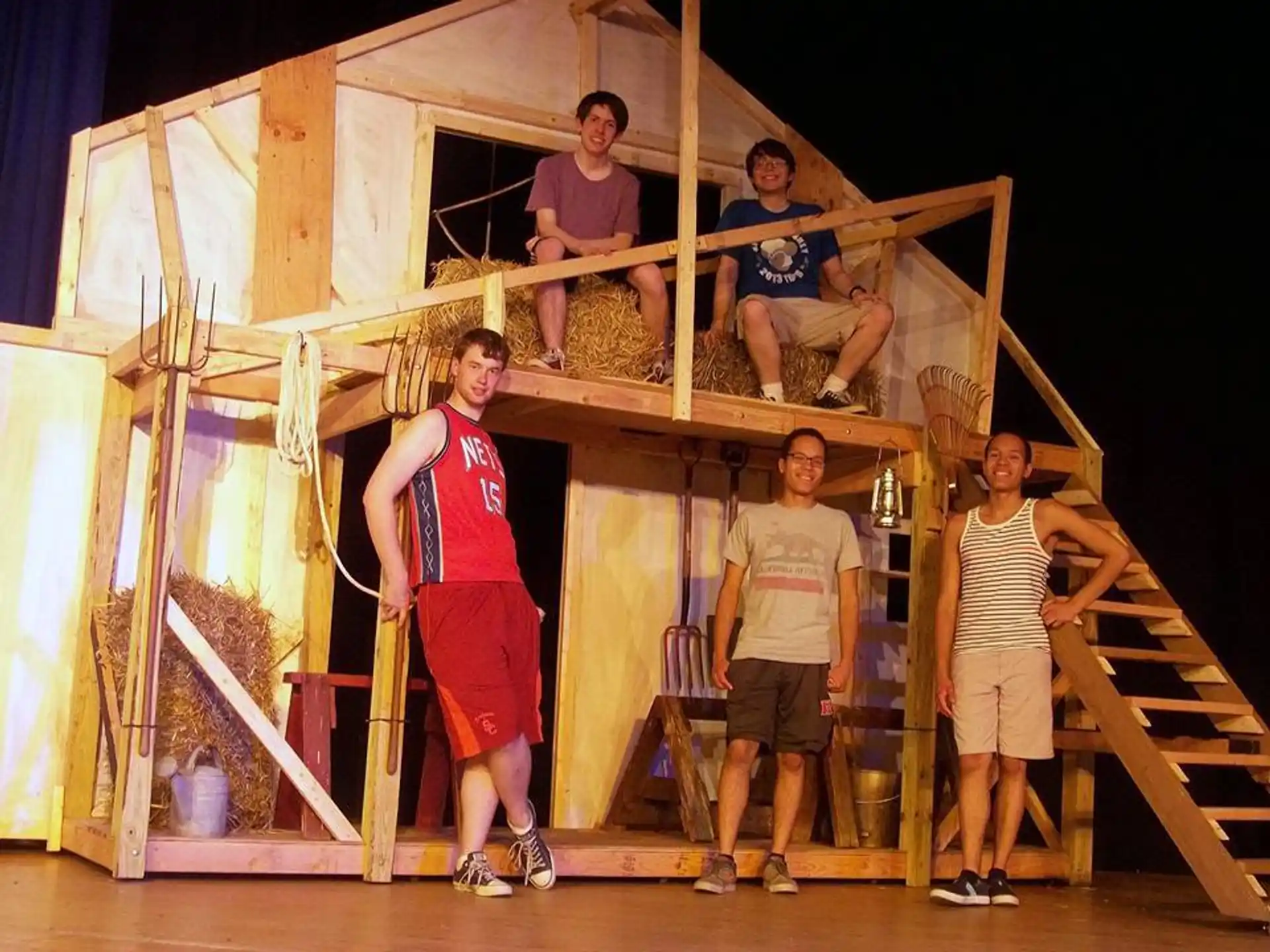 a group of people on a wooden structure