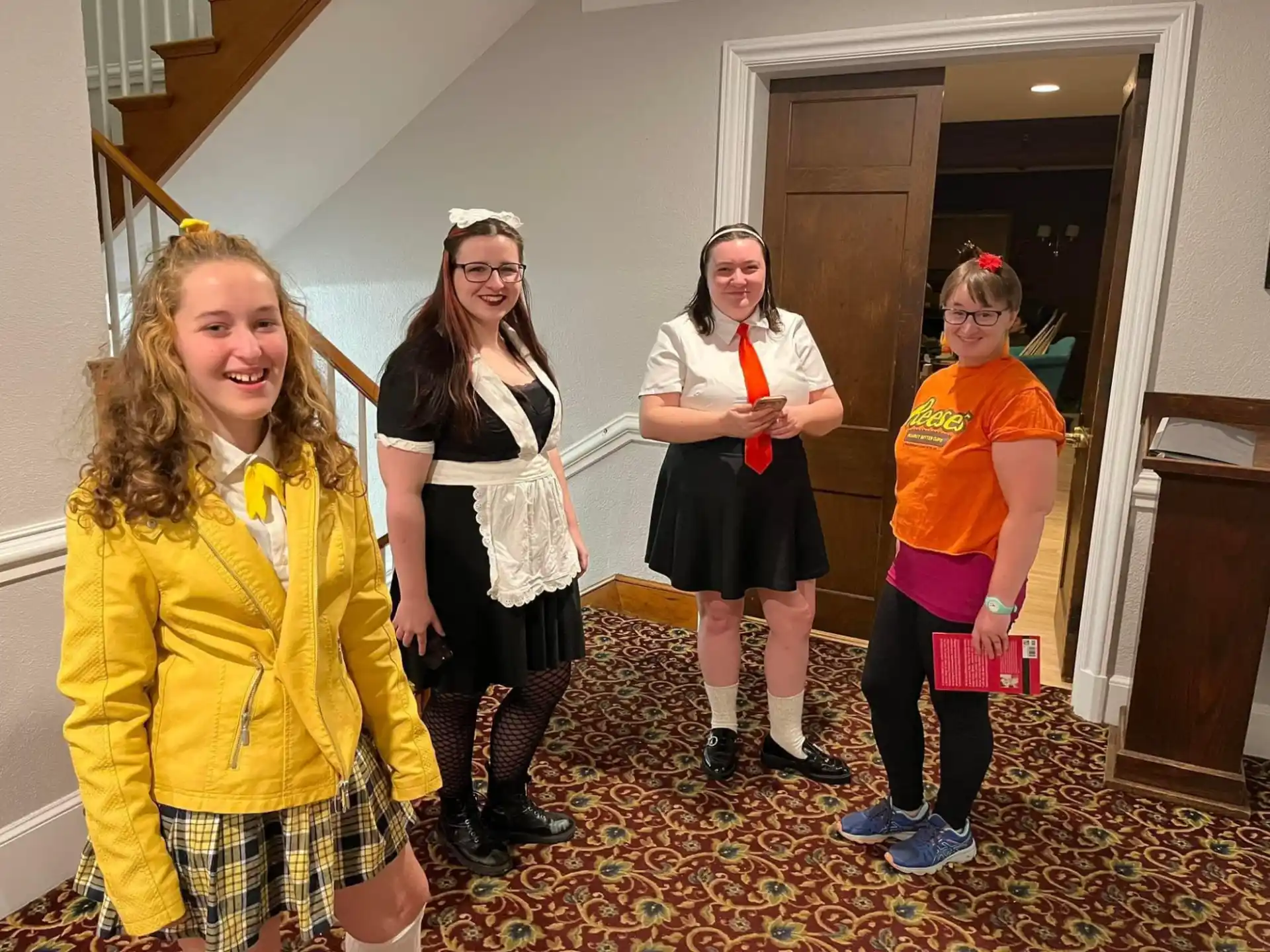a group of girls posing for a photo