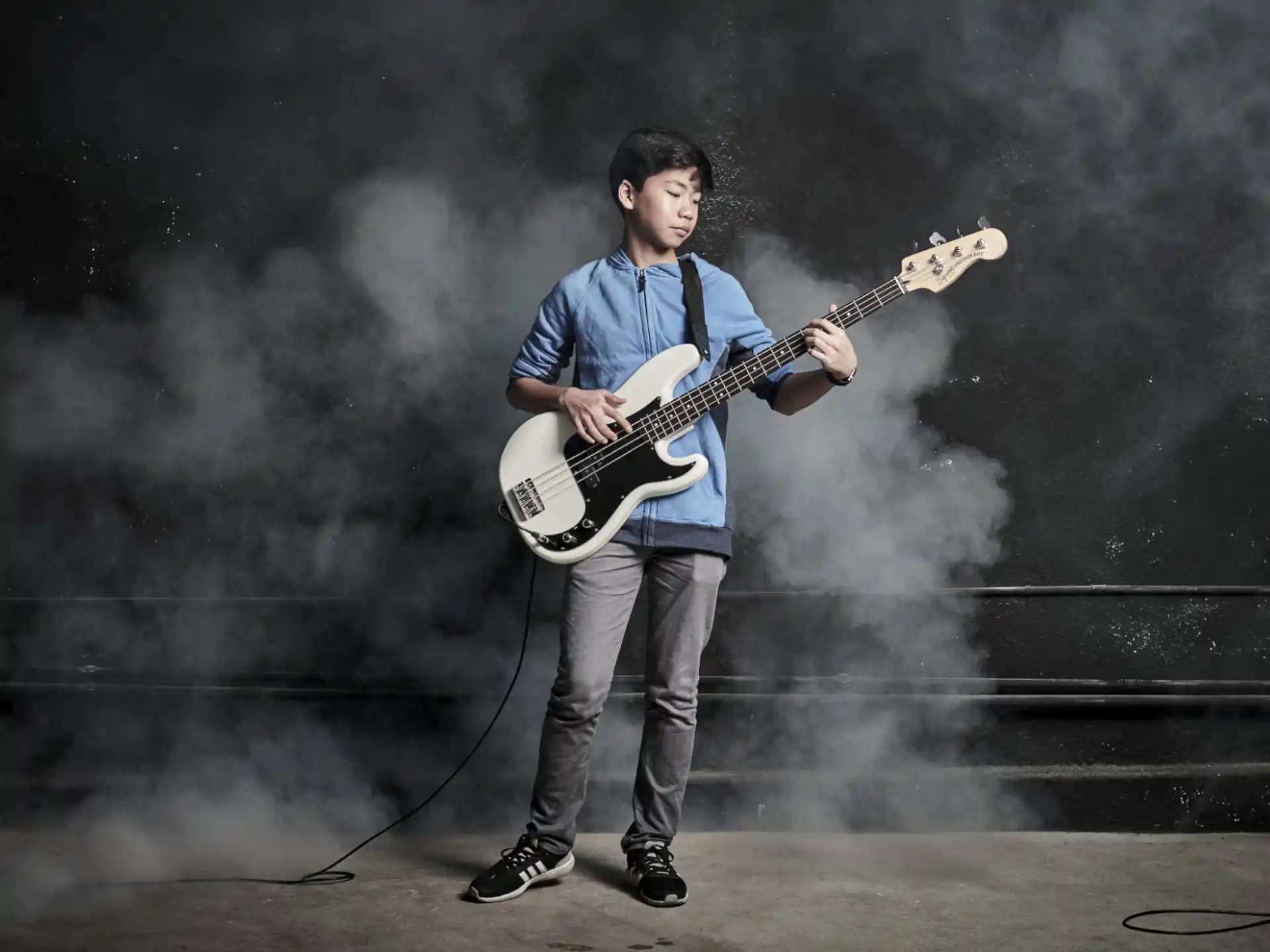 a man playing a guitar