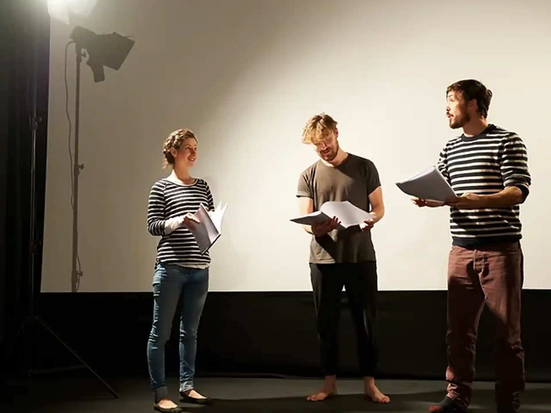 a group of people standing on a stage