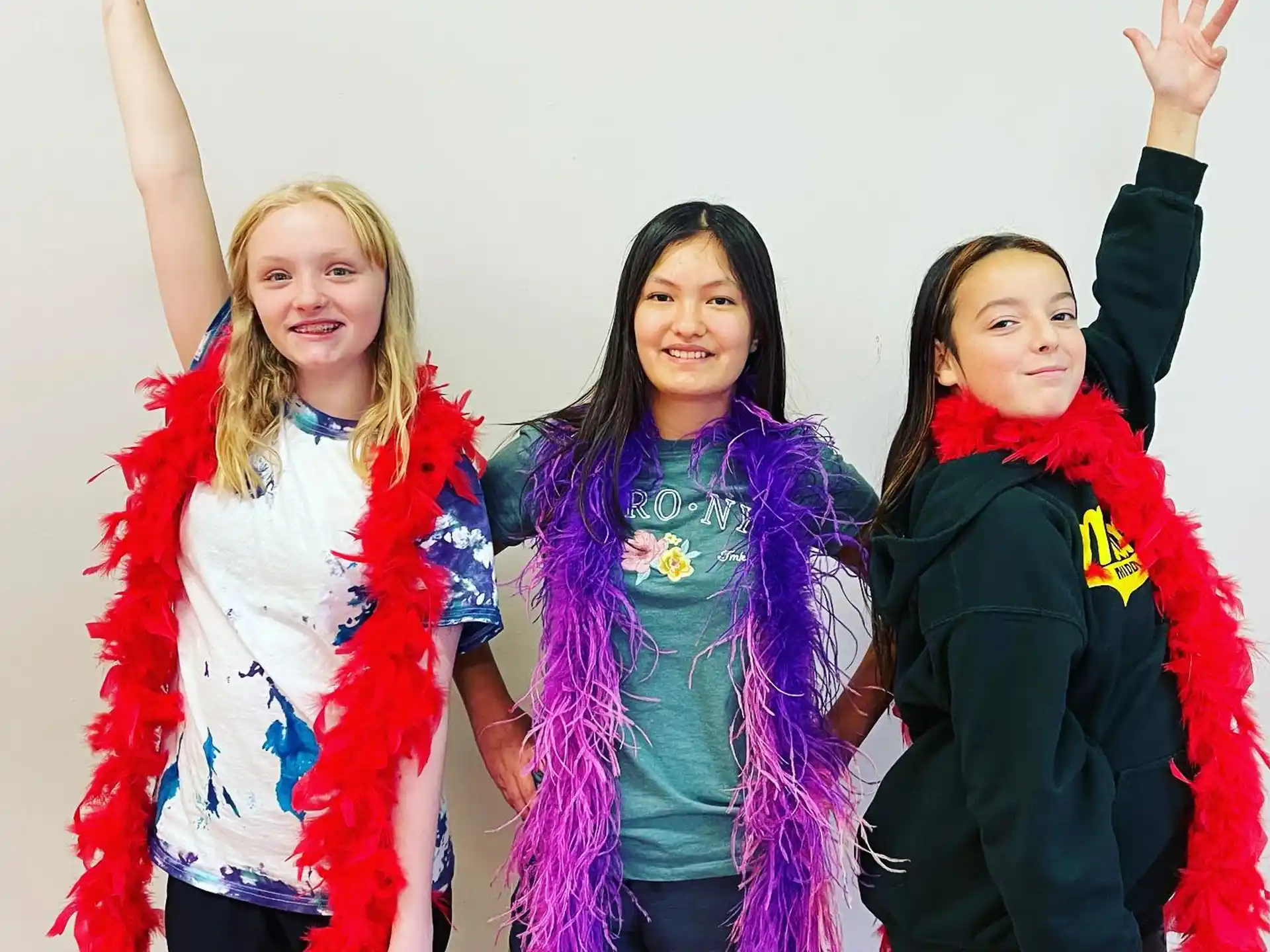 a group of girls posing for a picture