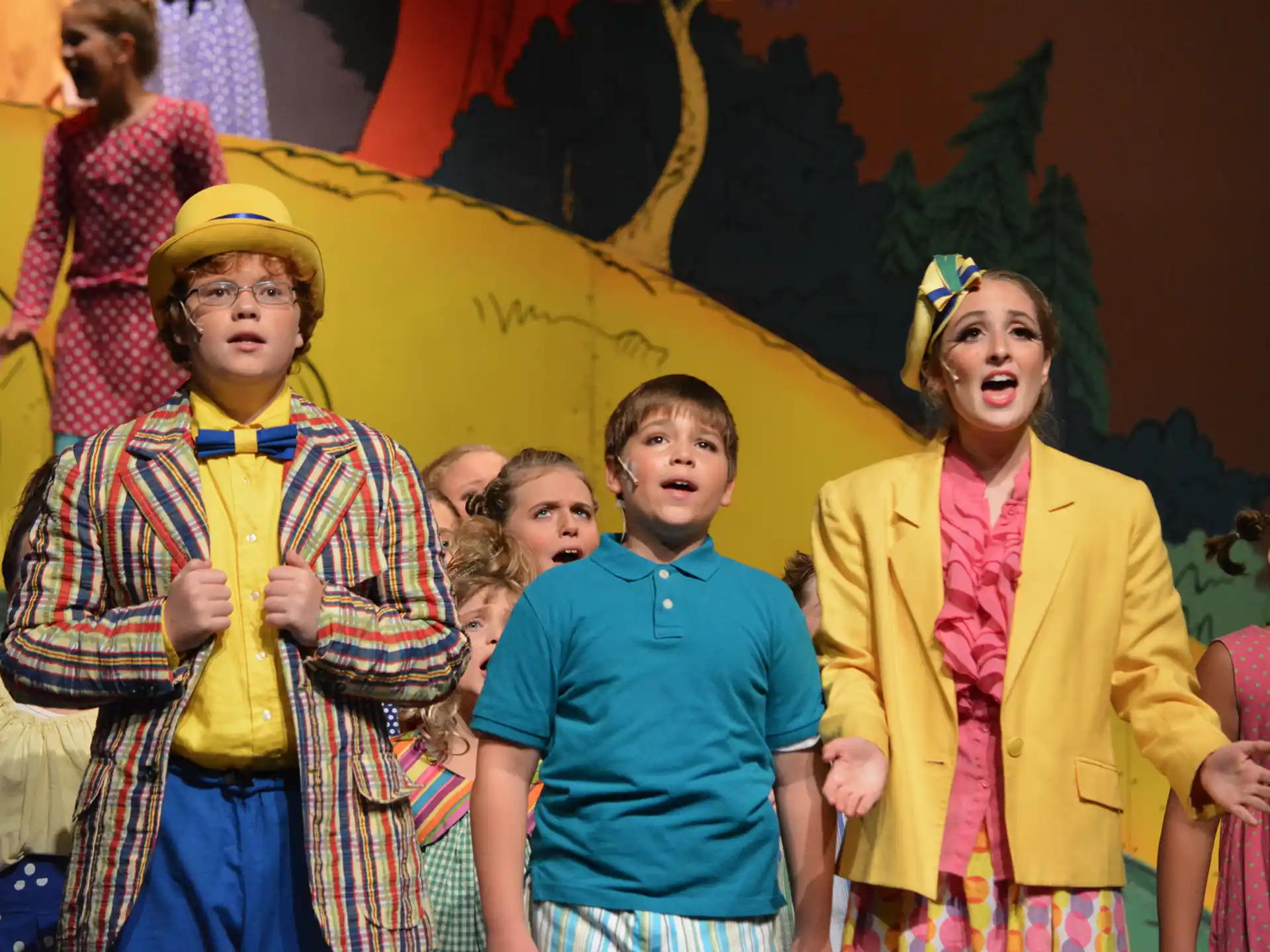 a group of children in clothing