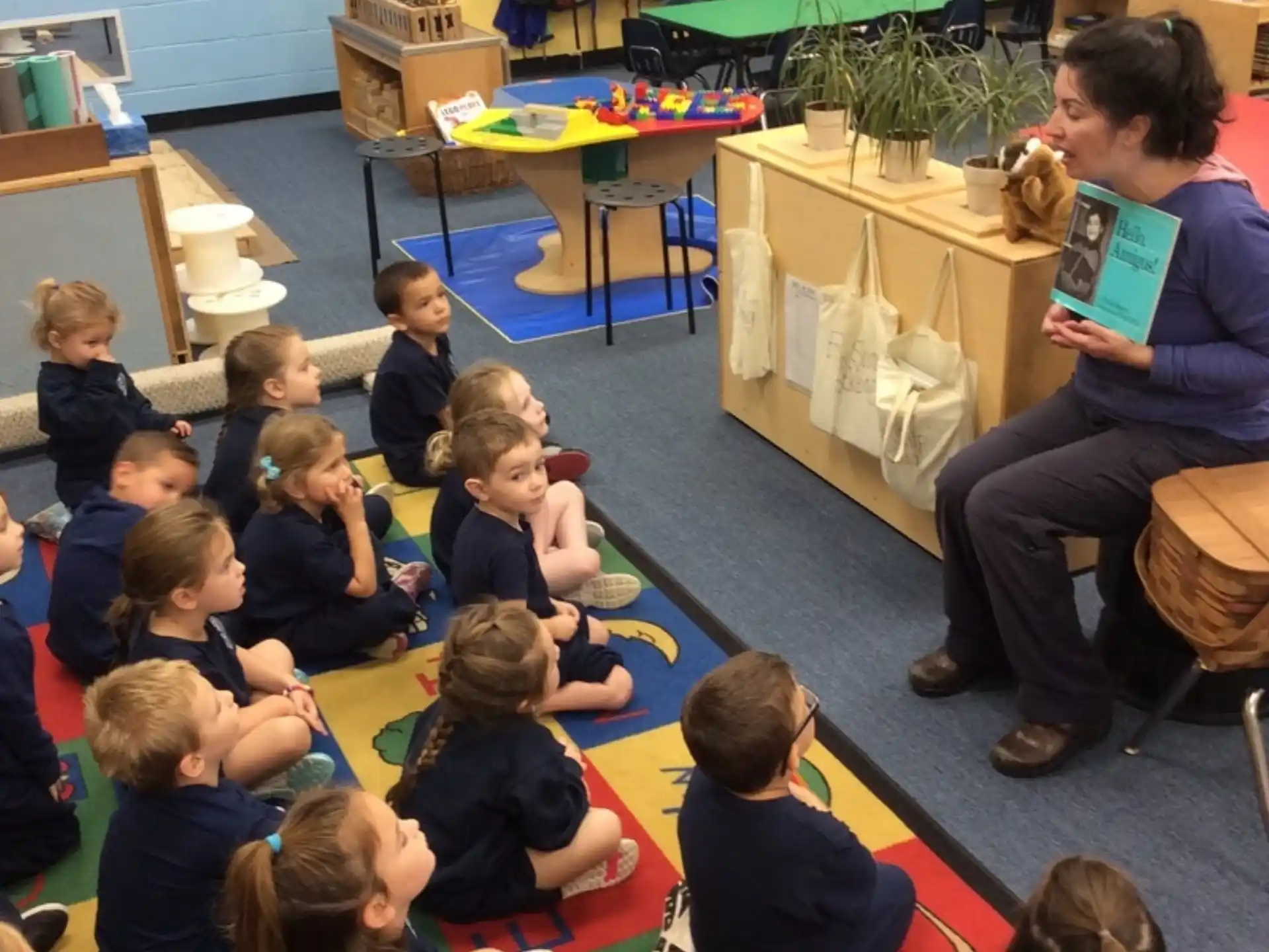 a group of children sitting in a classroom