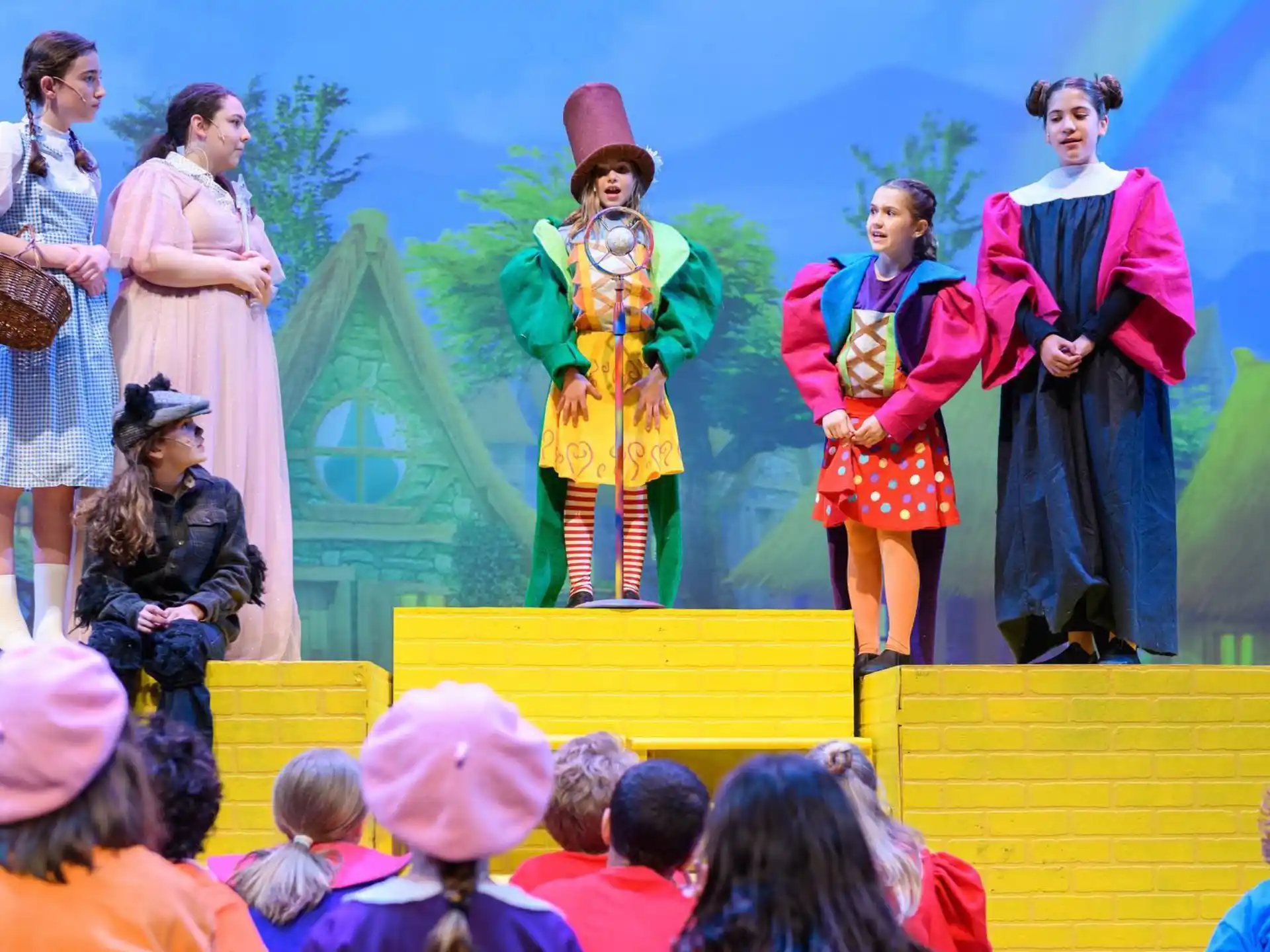 a group of women performing on stage