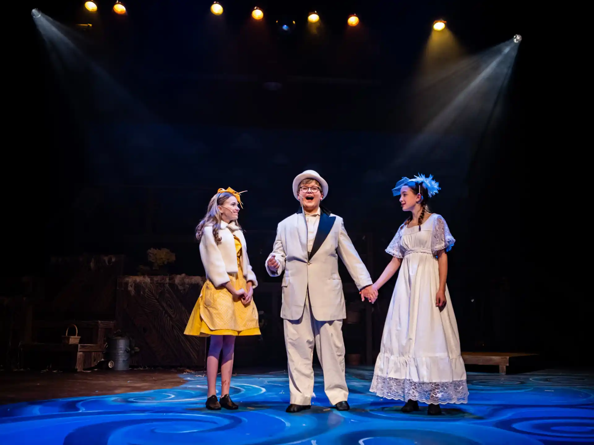 a group of people on a stage