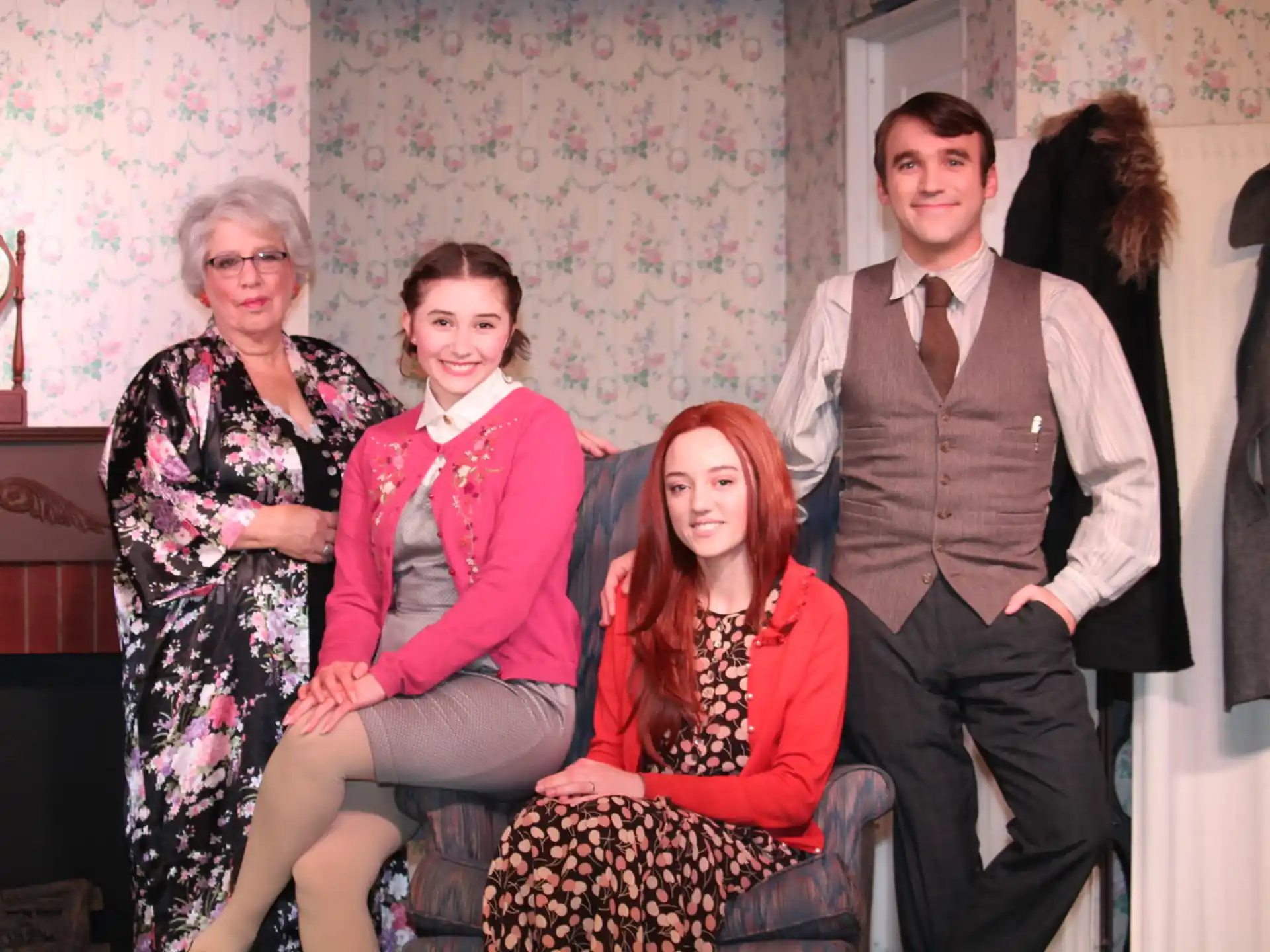 a group of people posing for a photo