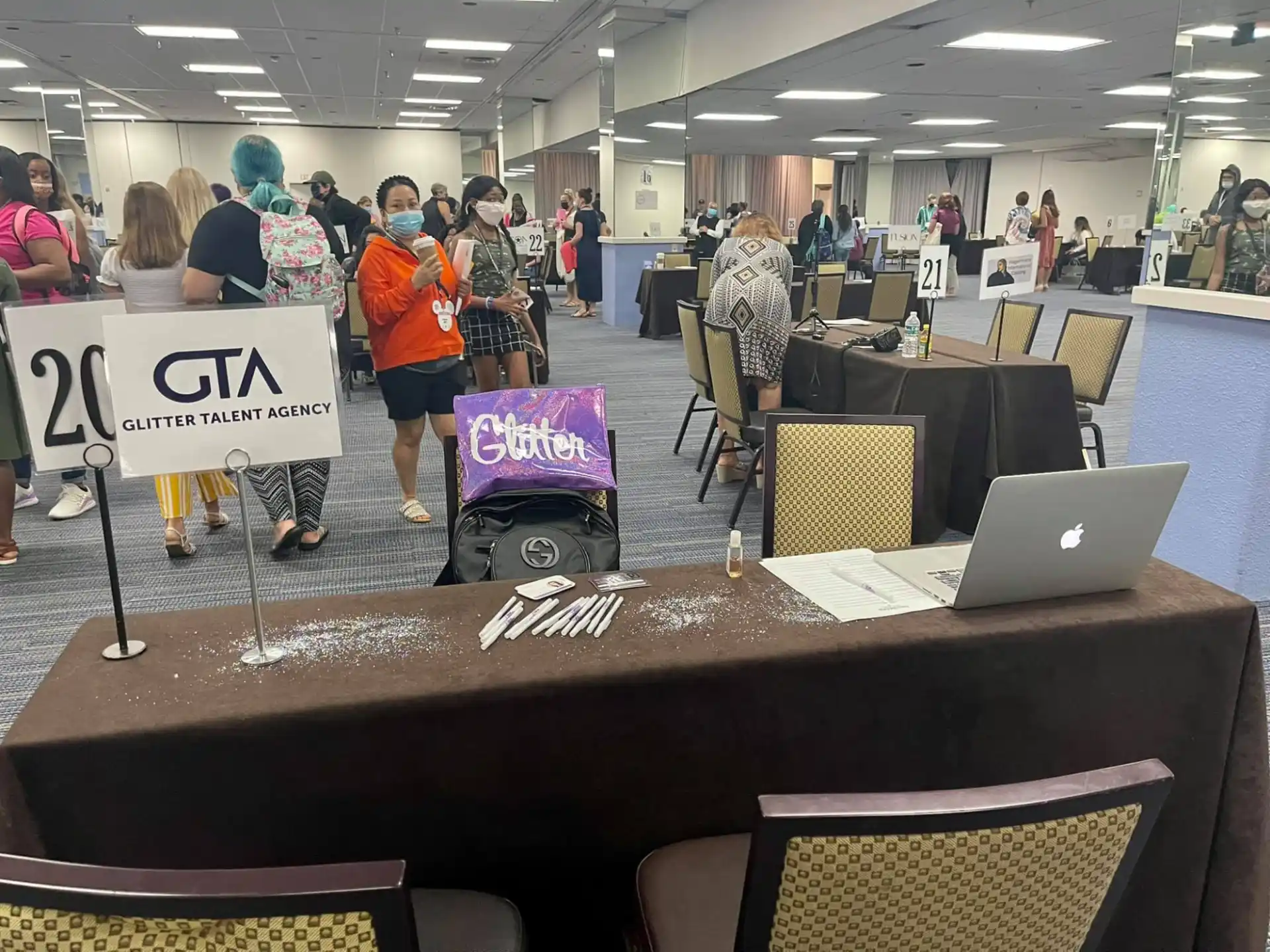 a group of people at a convention