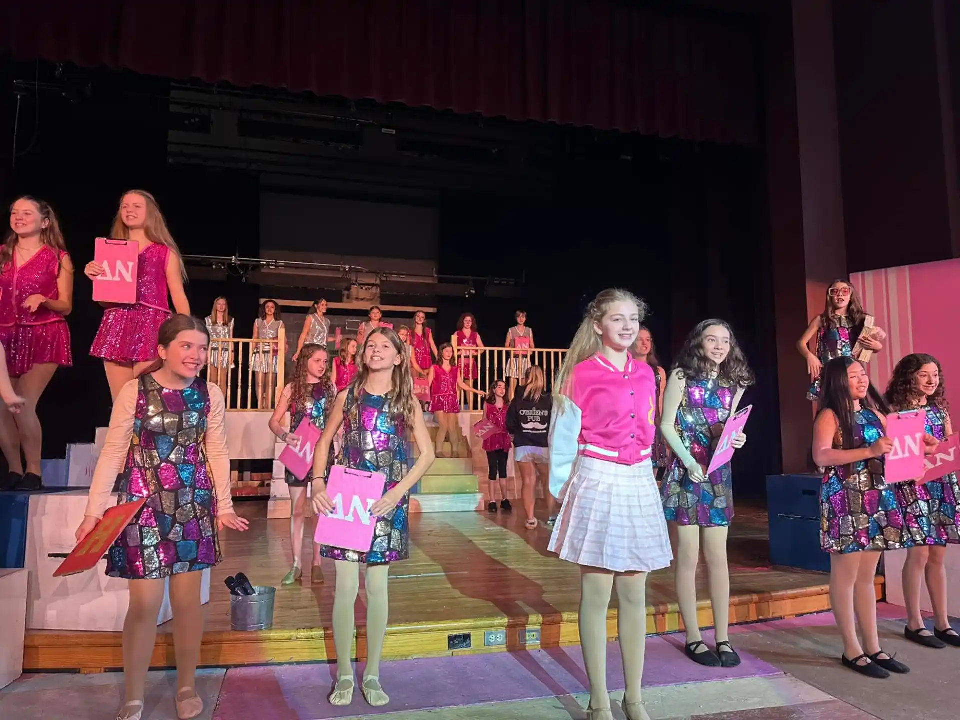 a group of girls on a stage
