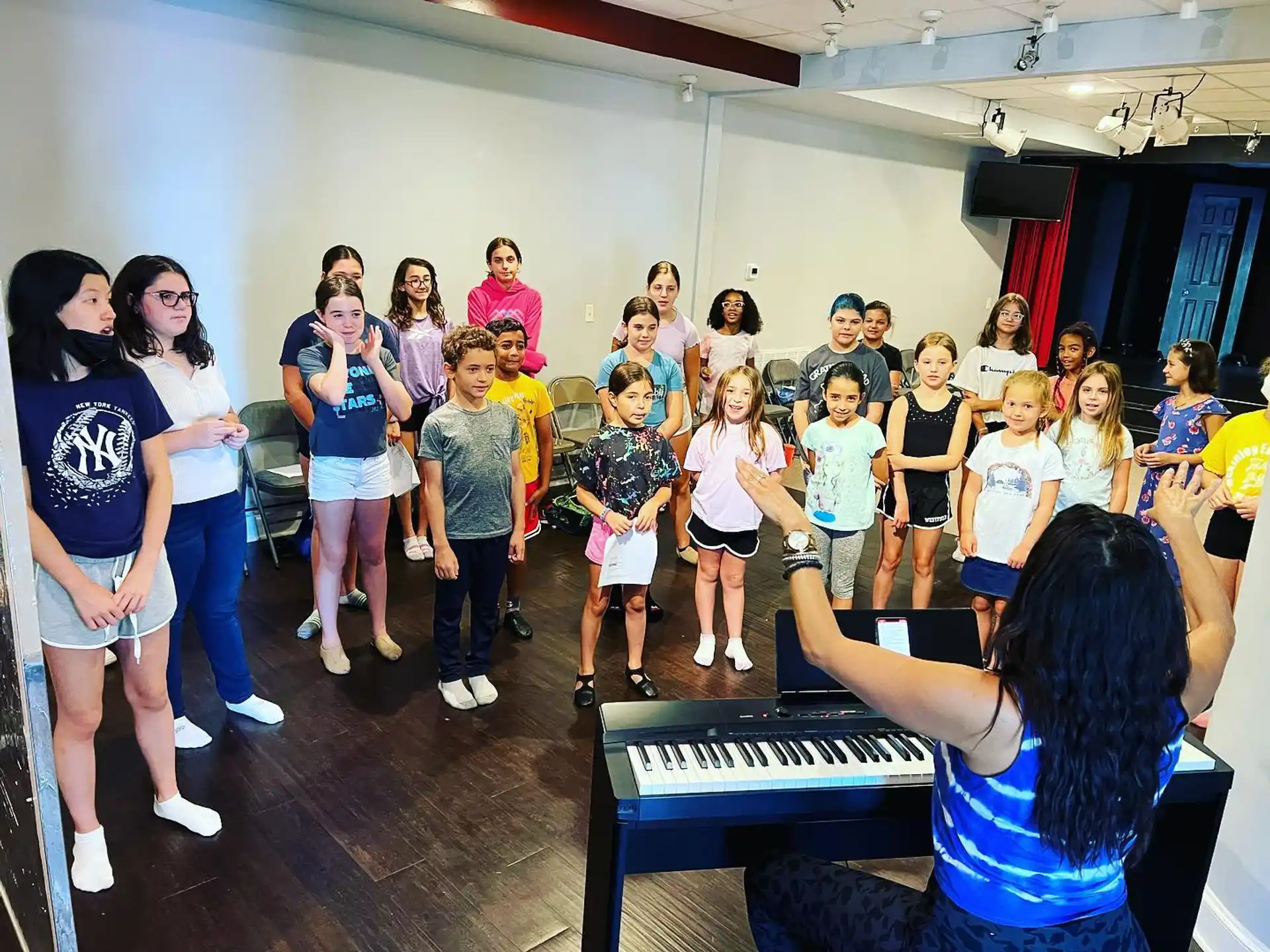 a group of people standing in a room