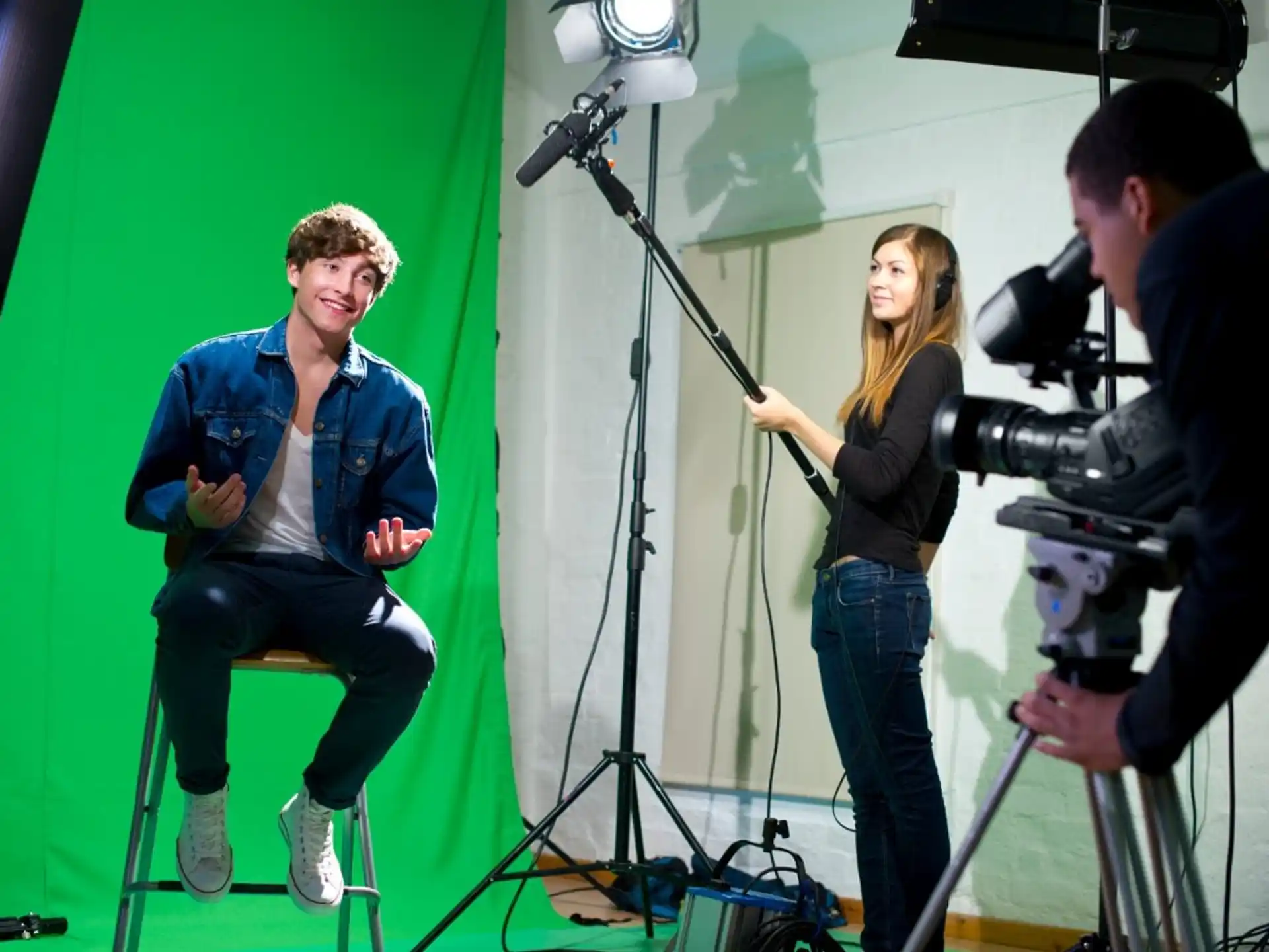 a man and a woman with cameras