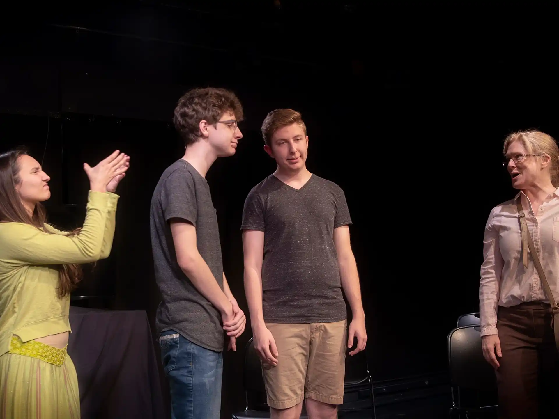 a group of people standing in a room