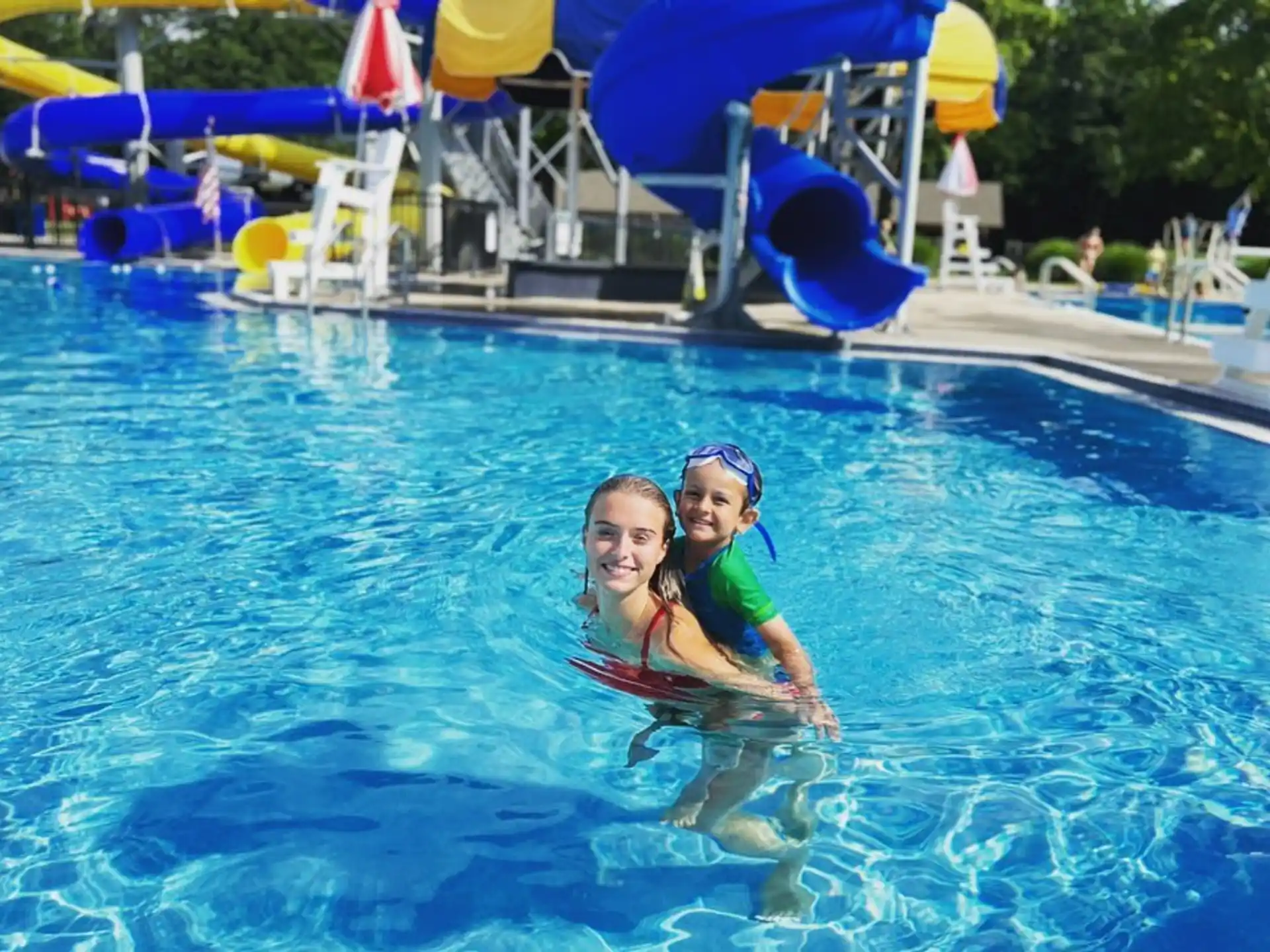 a couple of girls in a pool